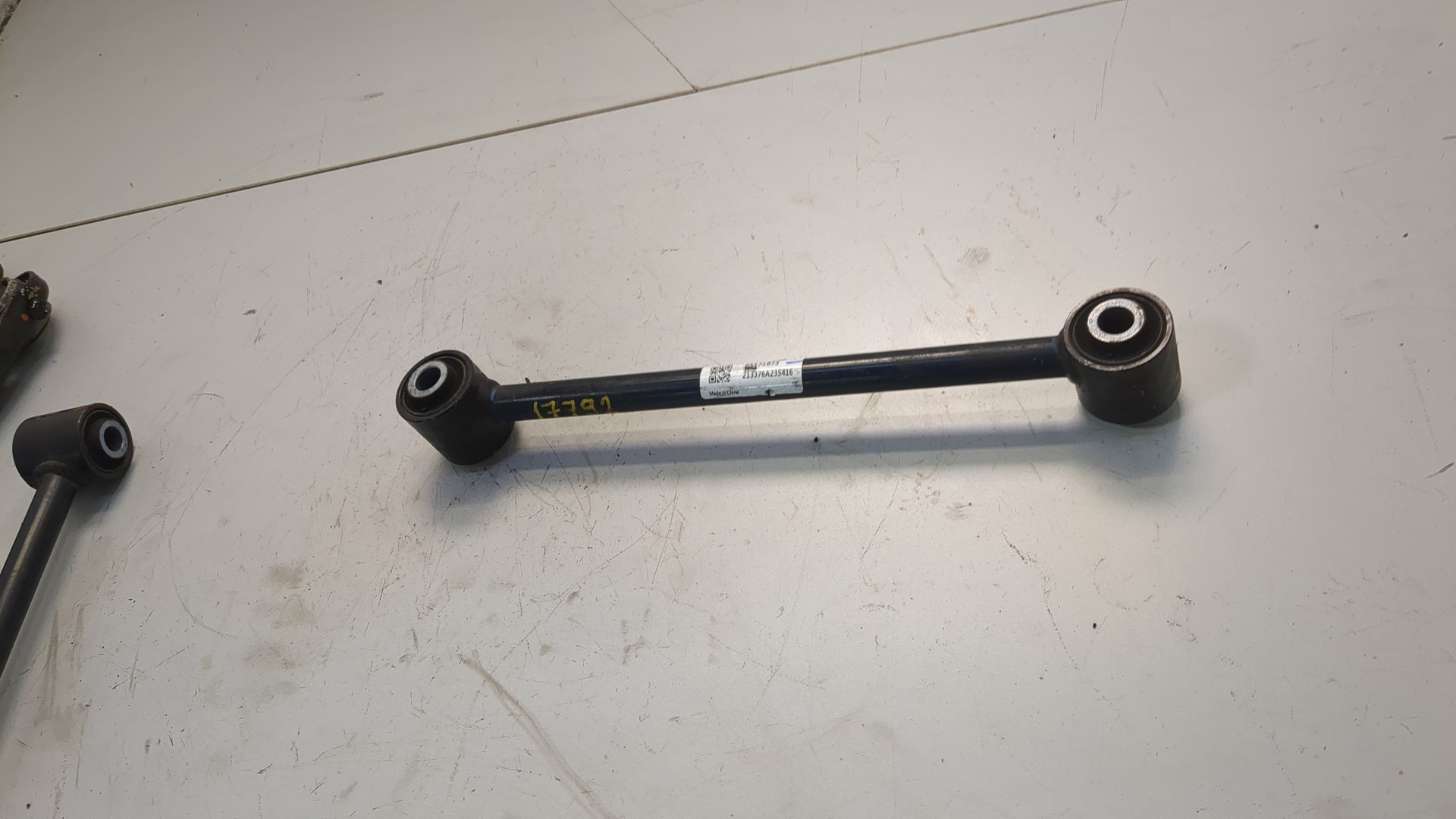 Рычаг задний