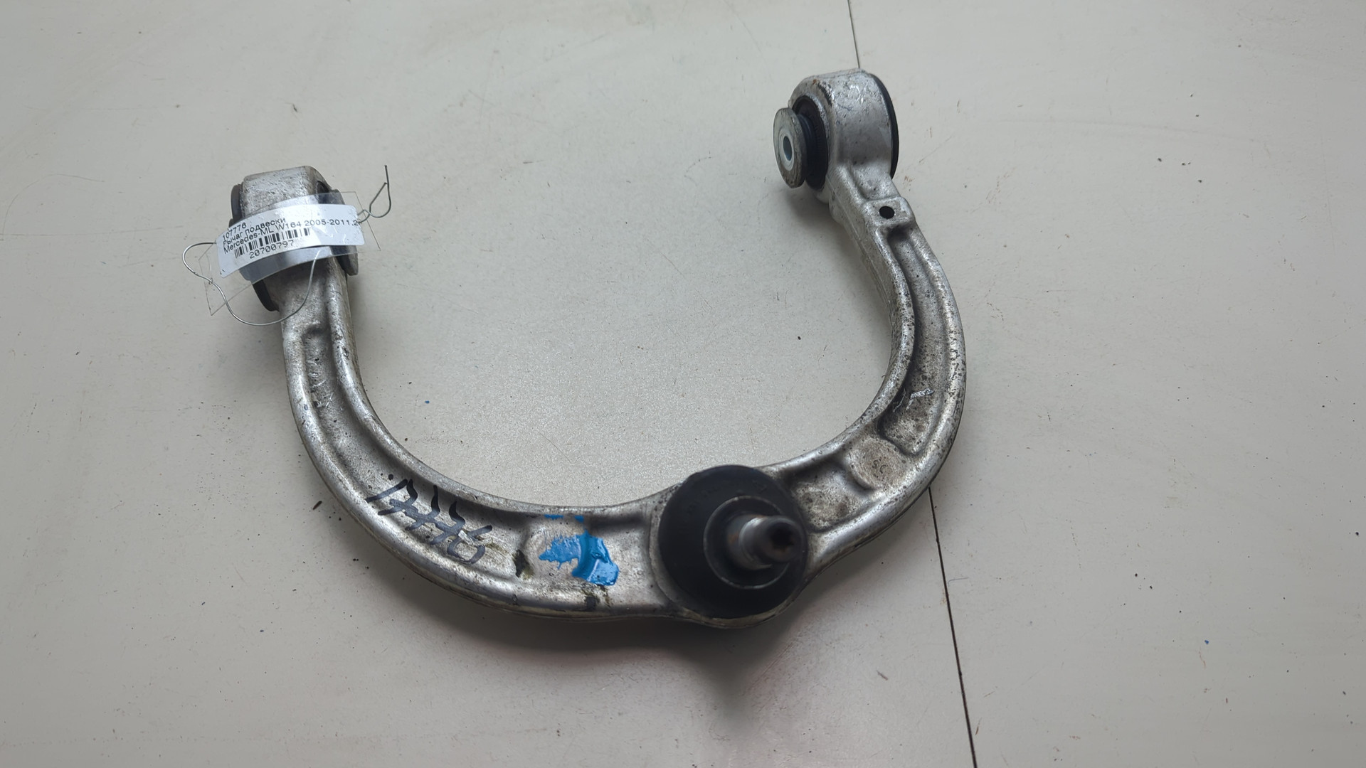 Рычаг передний левый