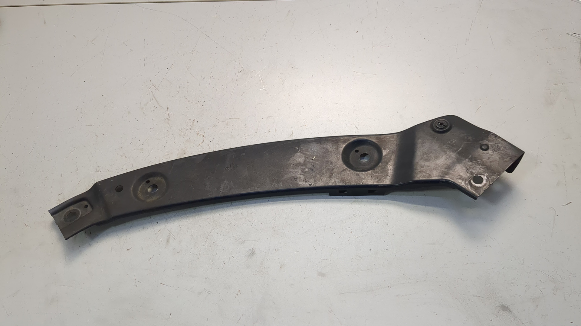 Кронштейн фар левый