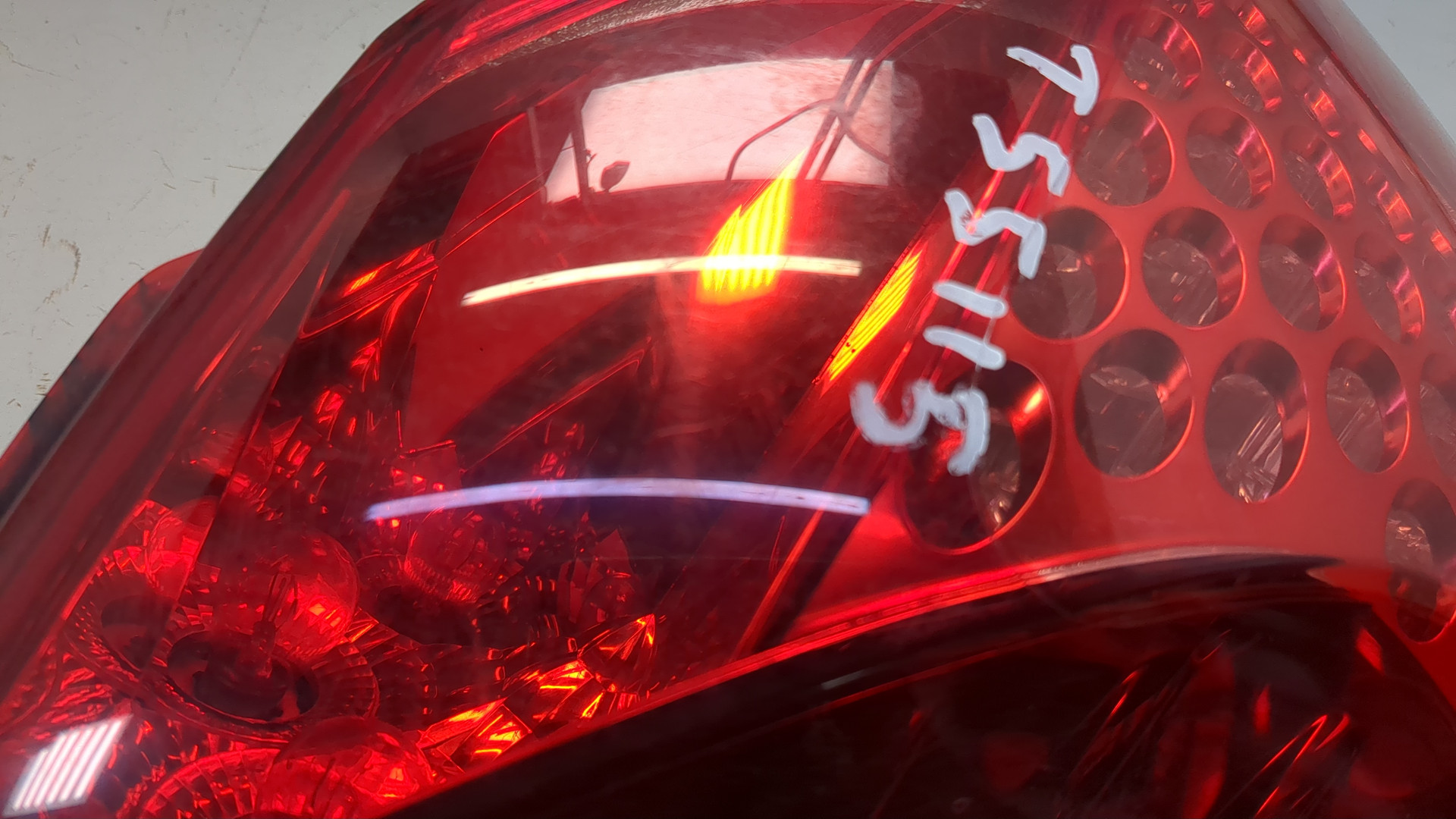 Фонарь задний левый