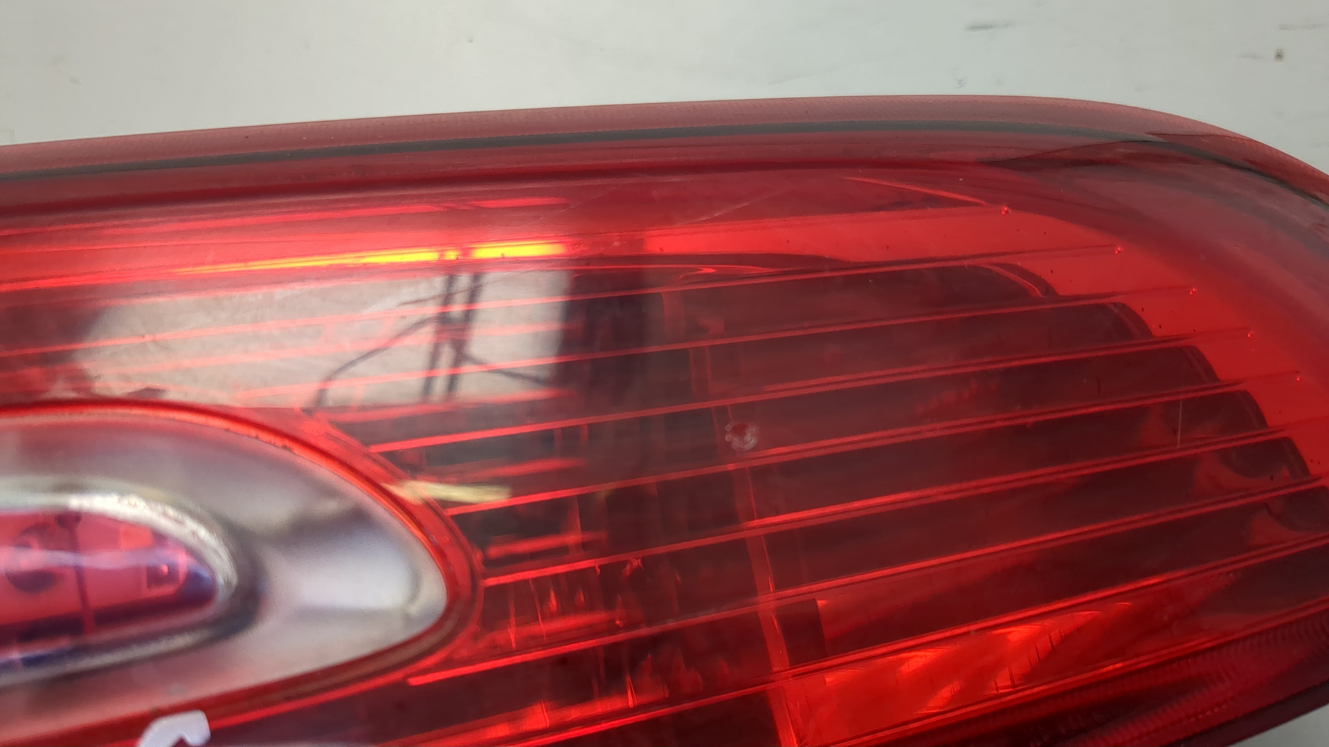 Фонарь задний левый