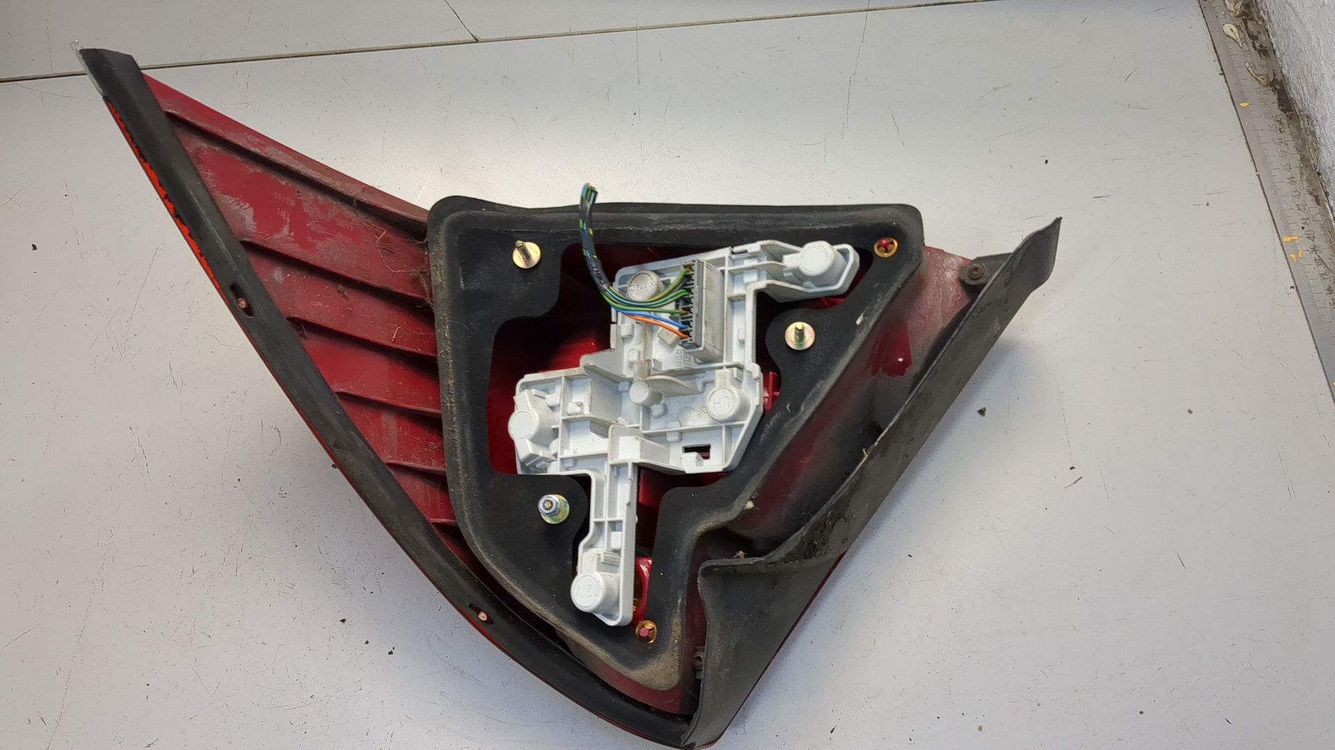 Фонарь задний левый