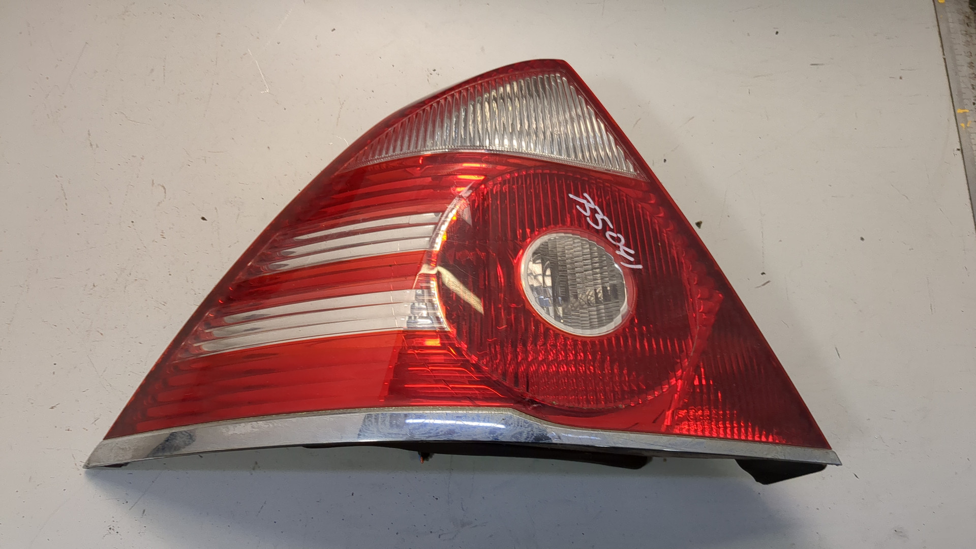 Фонарь задний левый