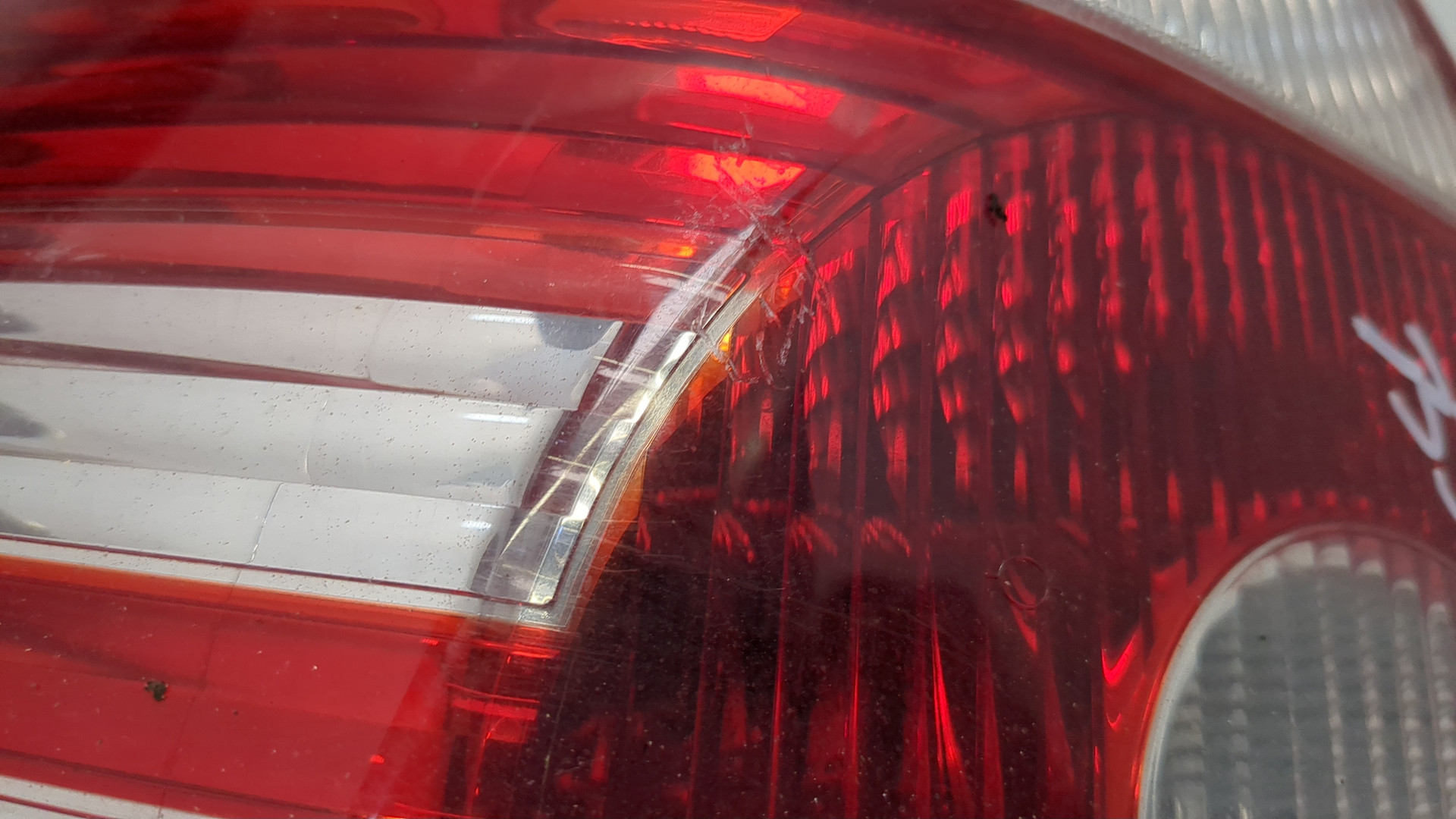 Фонарь задний левый