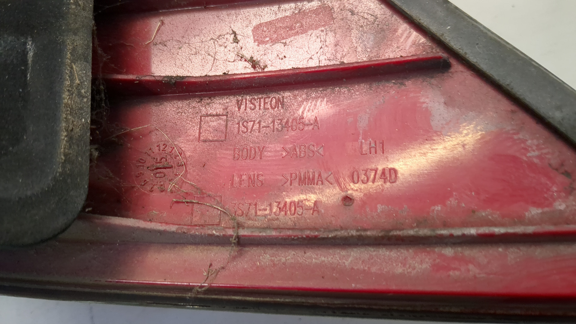 Фонарь задний левый