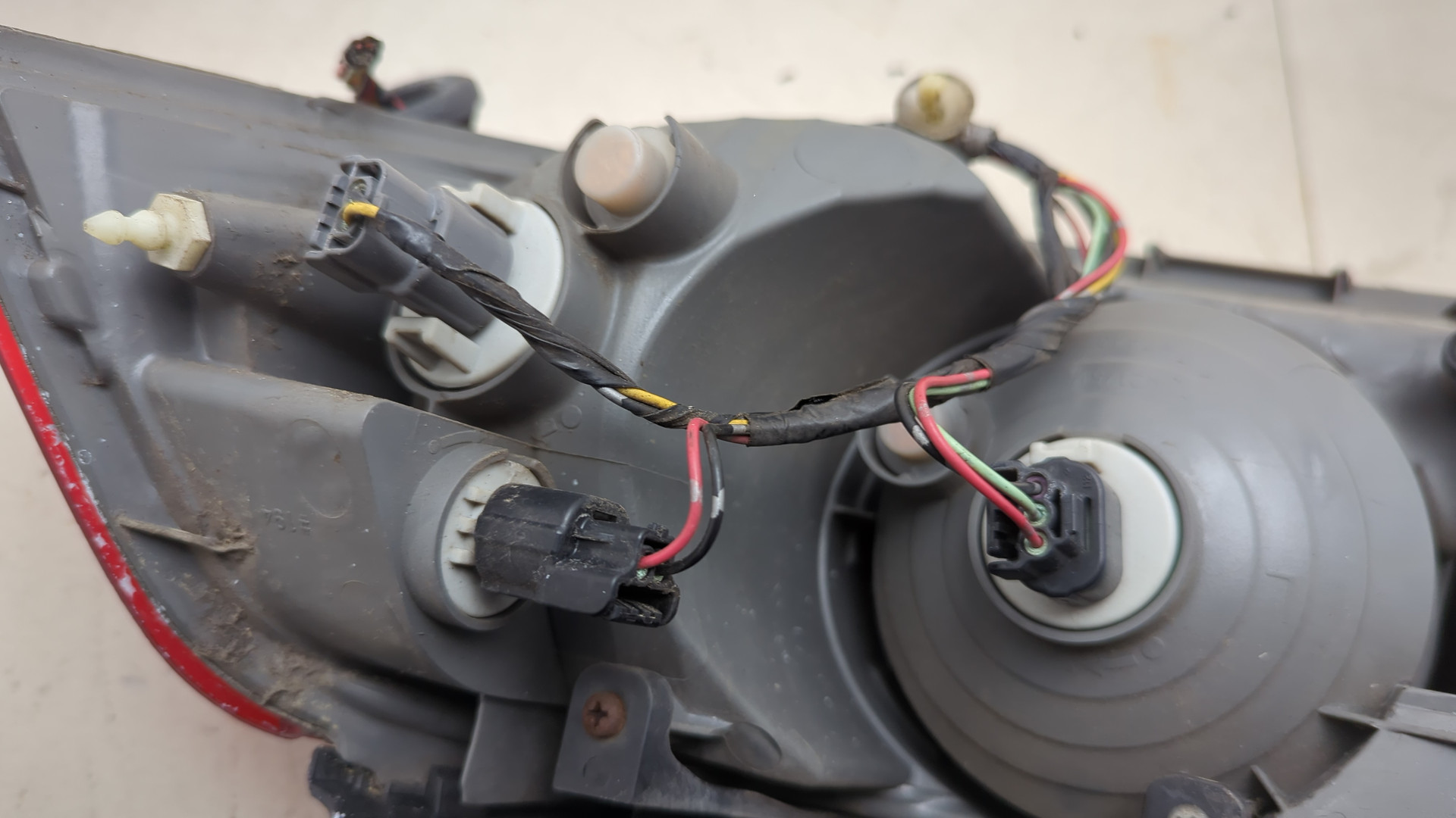 Фонарь задний левый