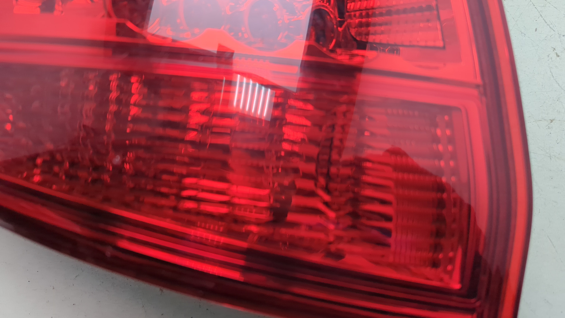 Фонарь задний левый