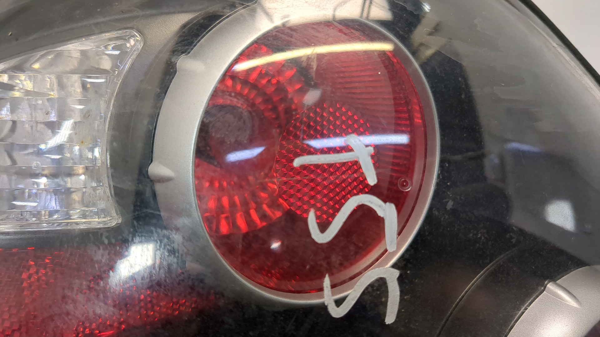 Фонарь задний левый