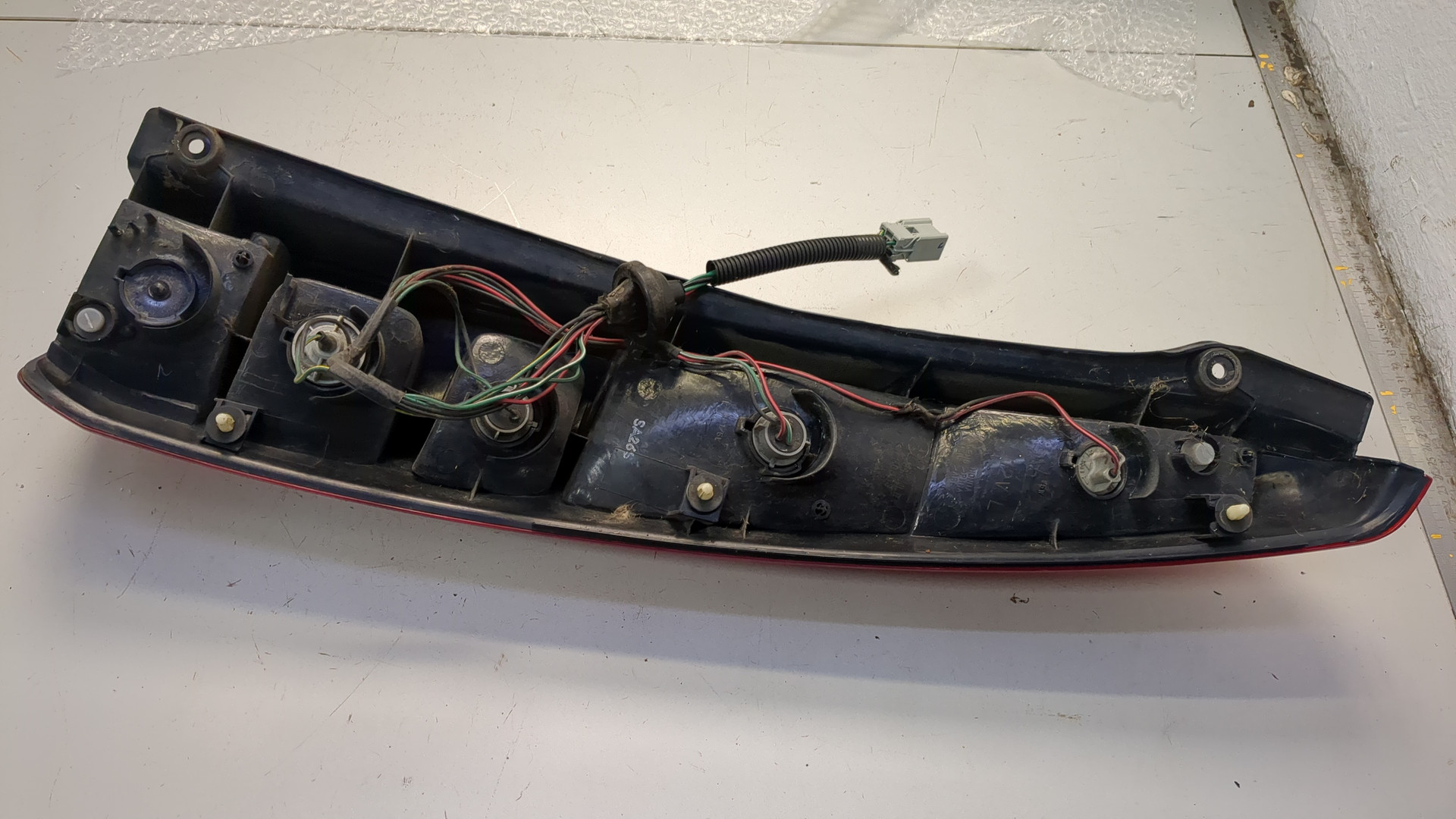 Фонарь задний левый