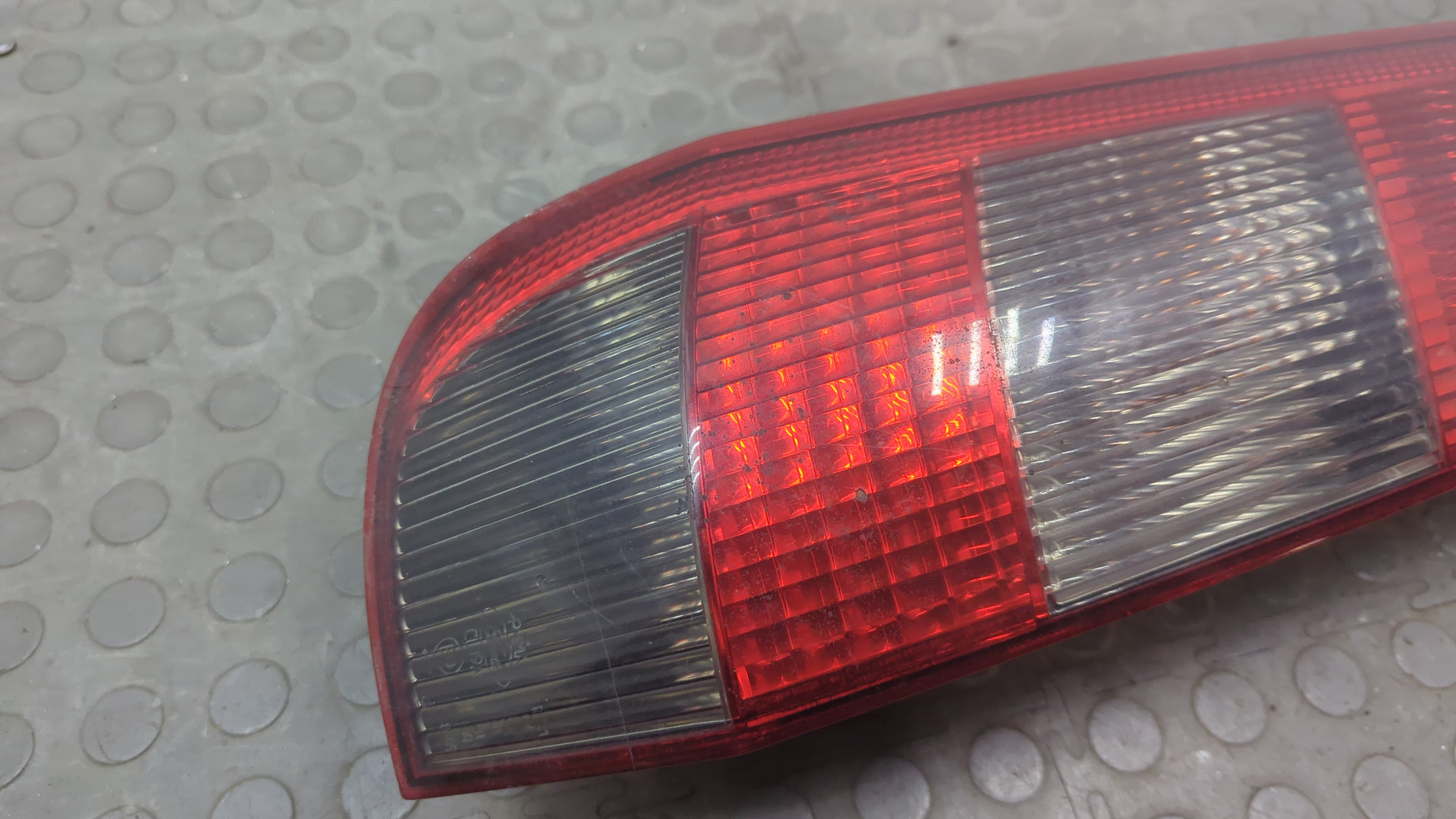 Фонарь задний левый