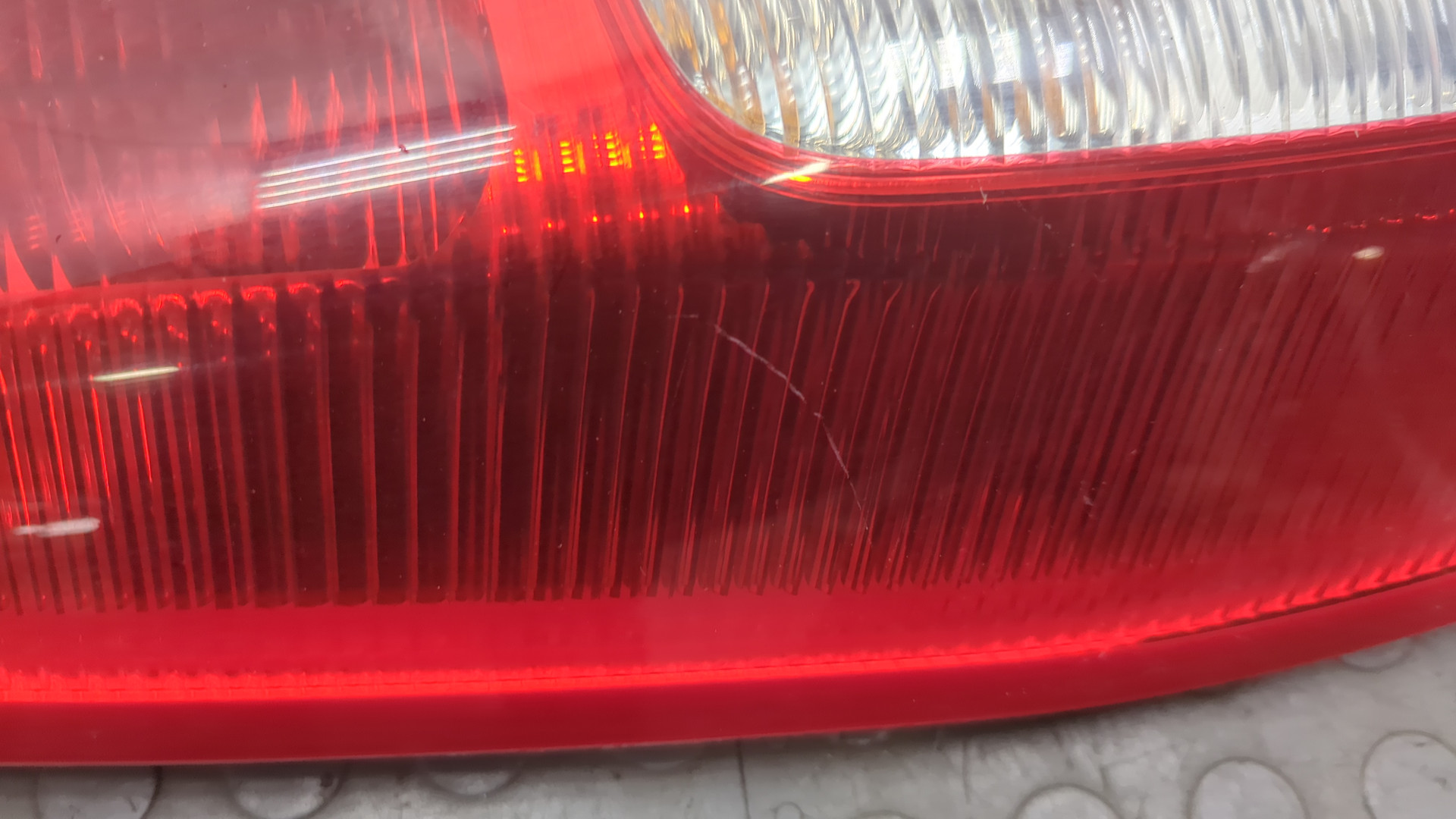 Фонарь задний левый