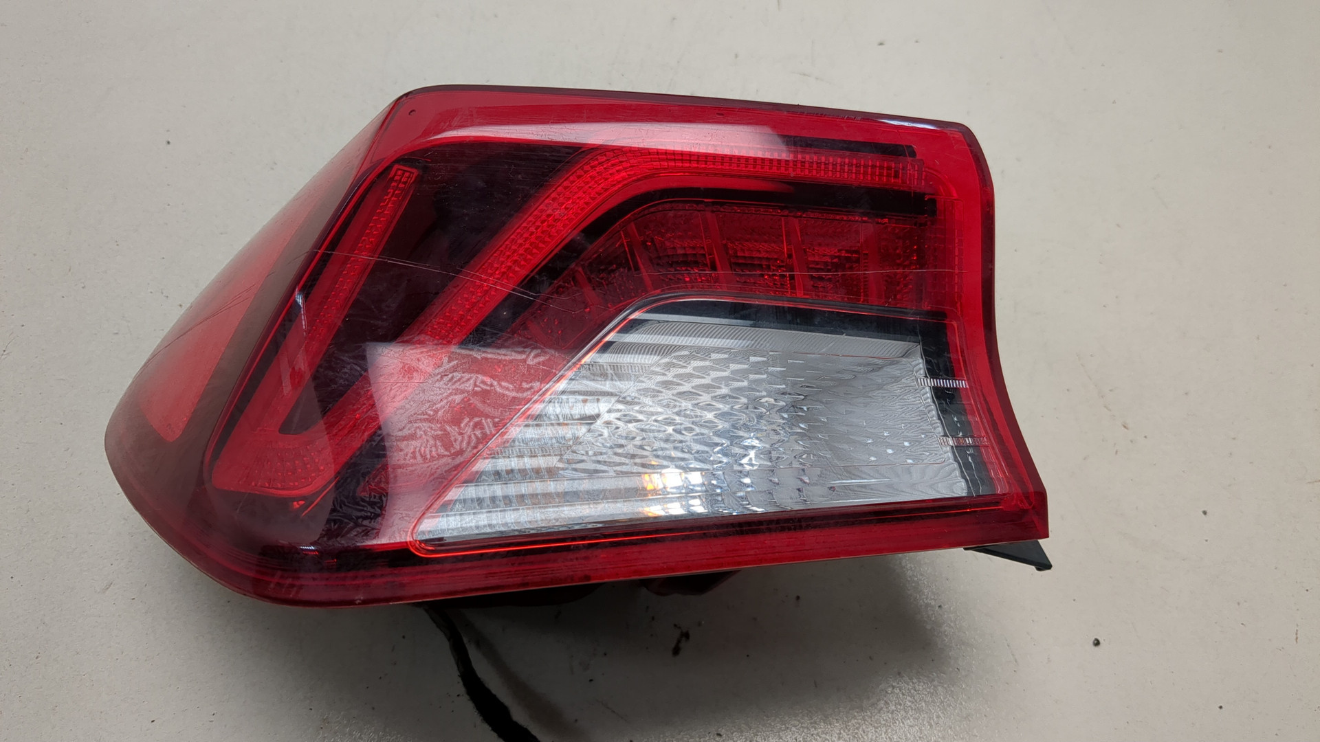 Фонарь задний левый