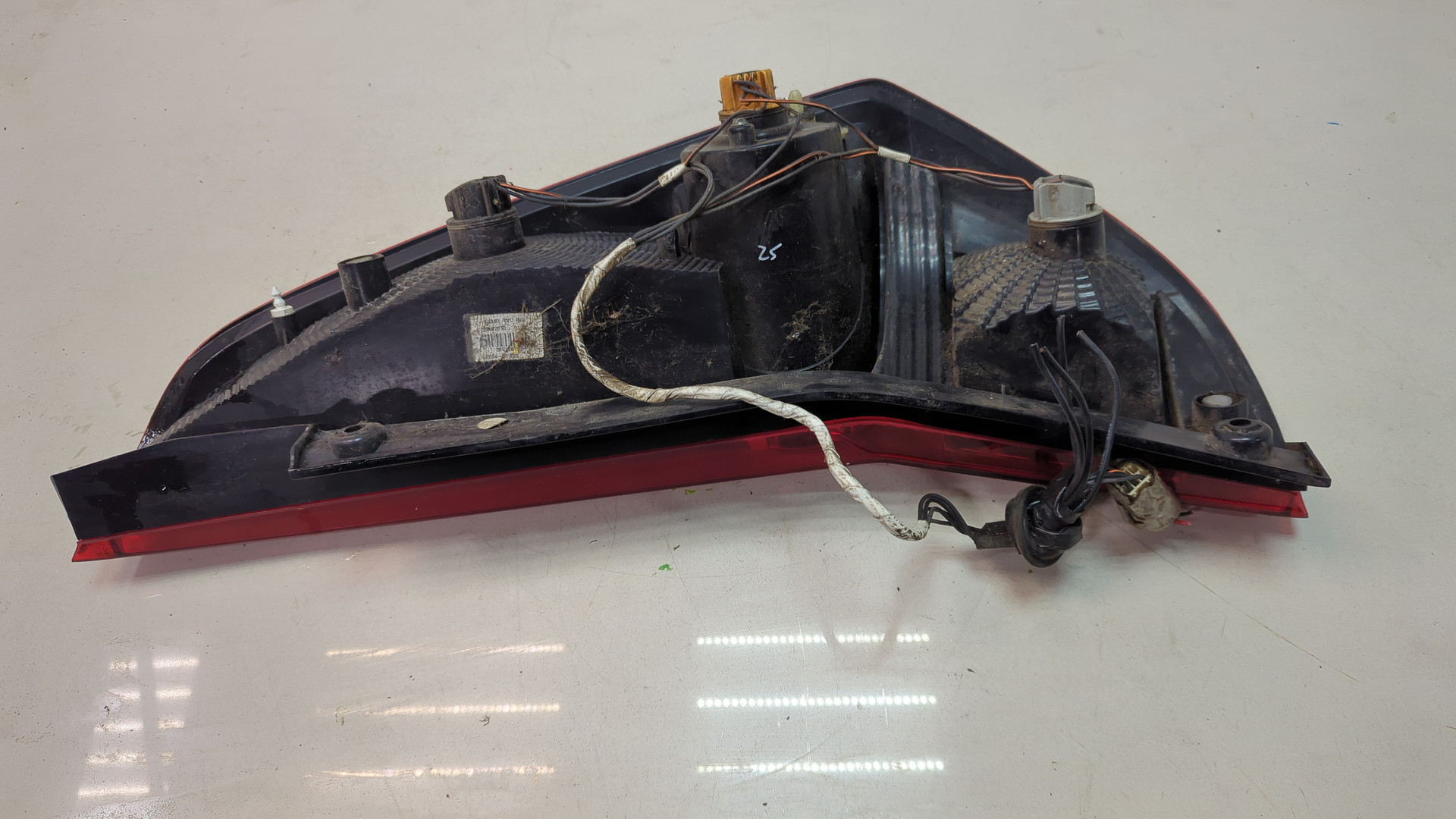 Фонарь задний левый