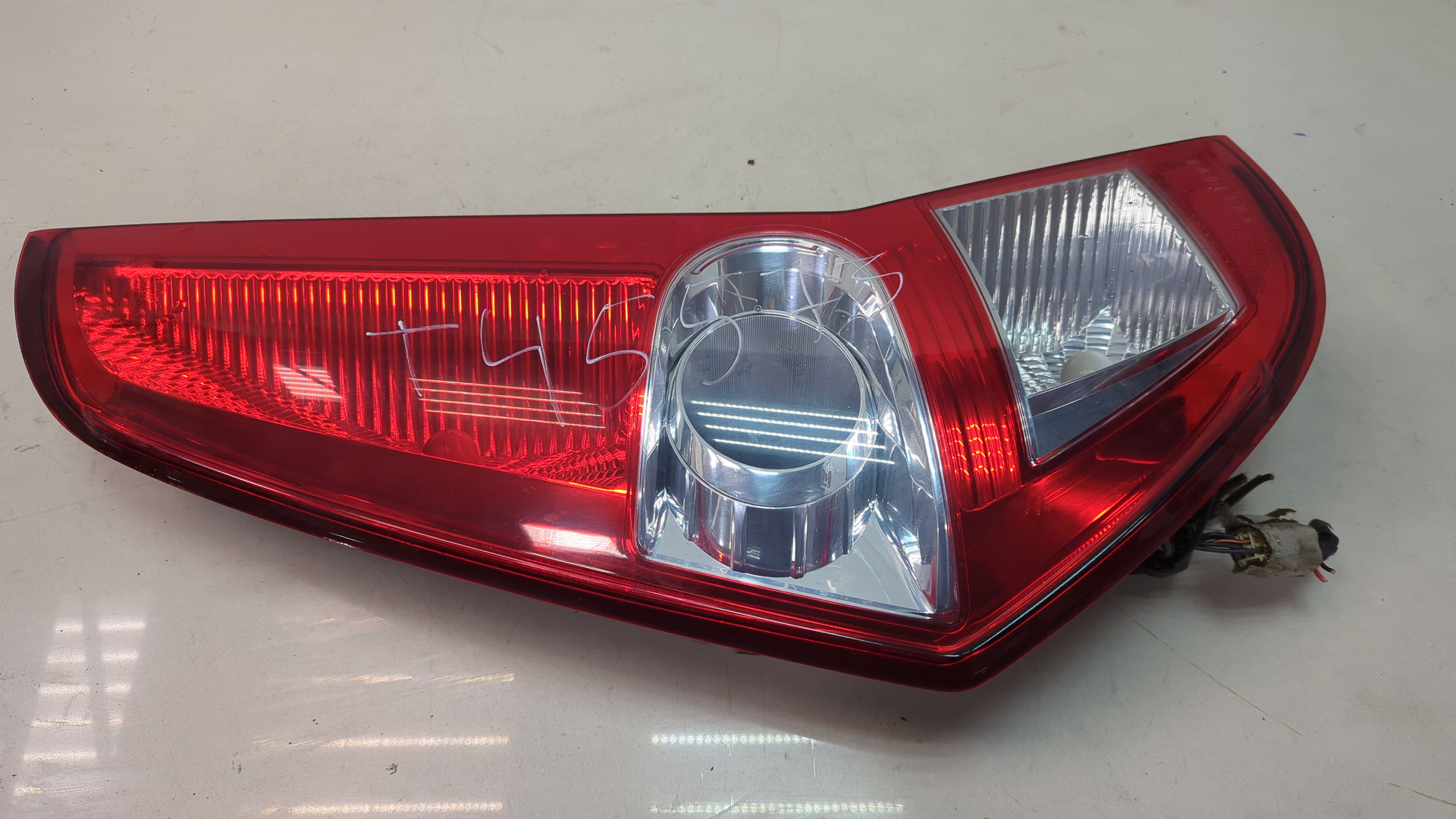 Фонарь задний левый