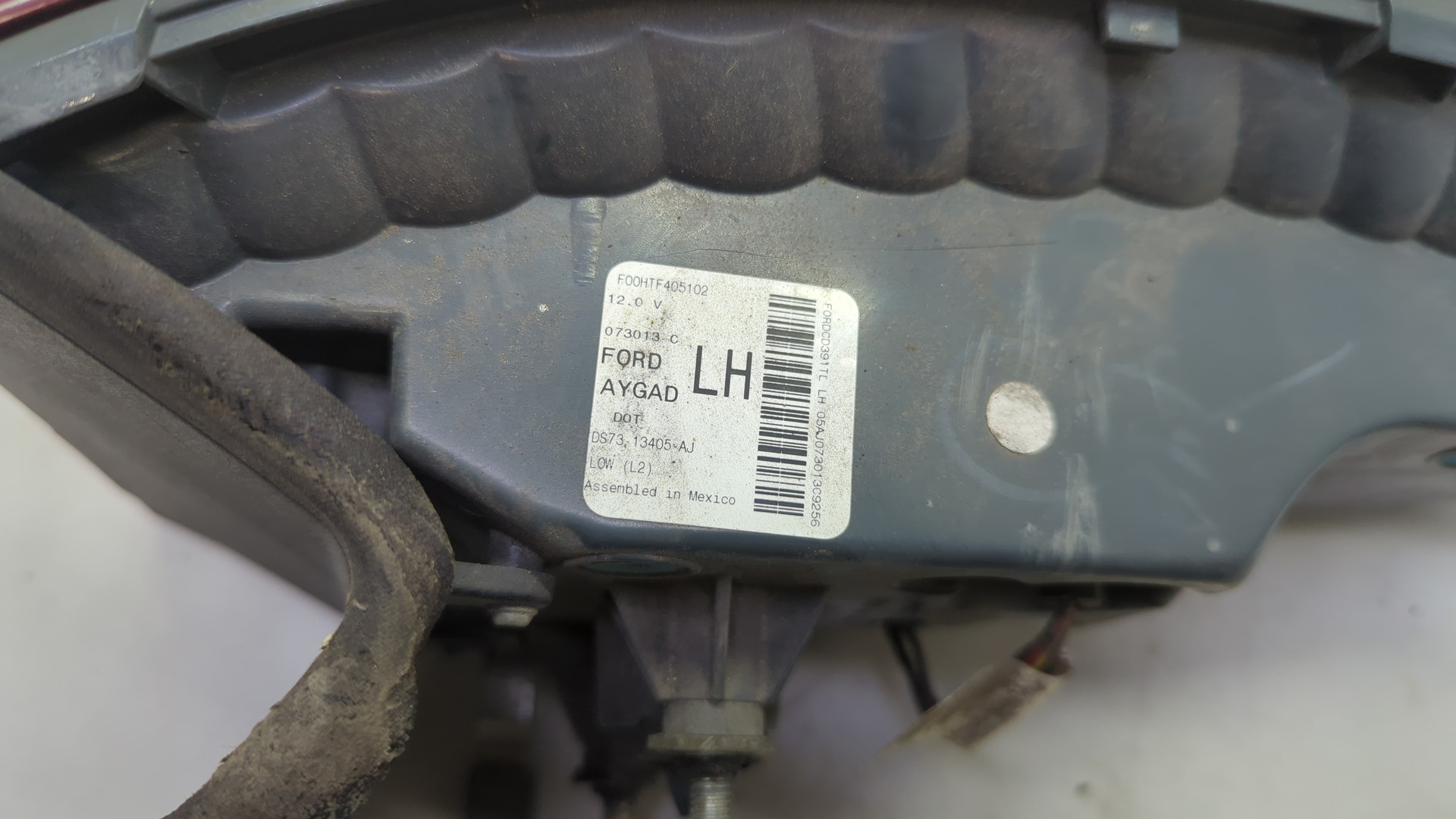 Фонарь задний левый