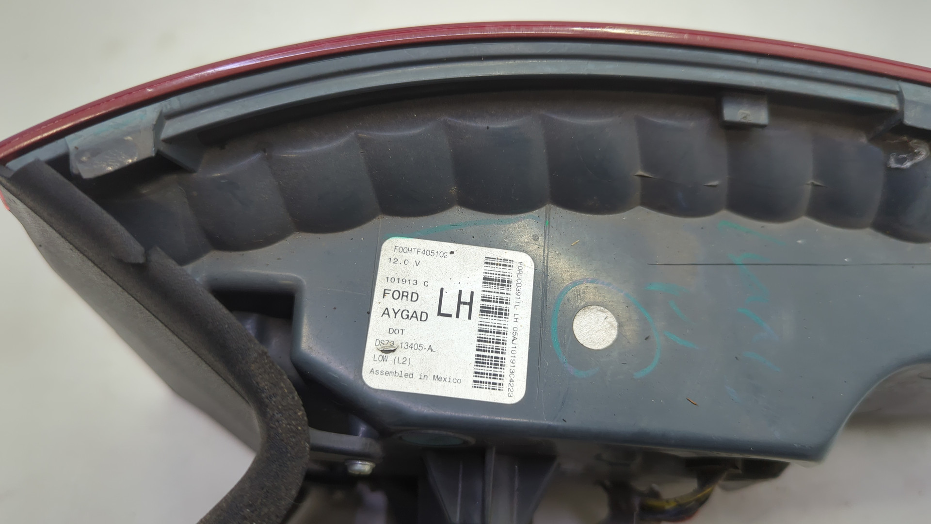 Фонарь задний левый