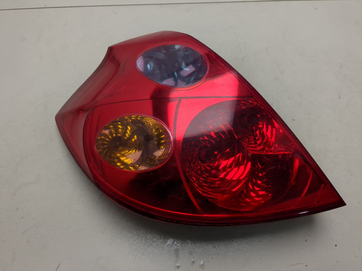 Фонарь задний левый