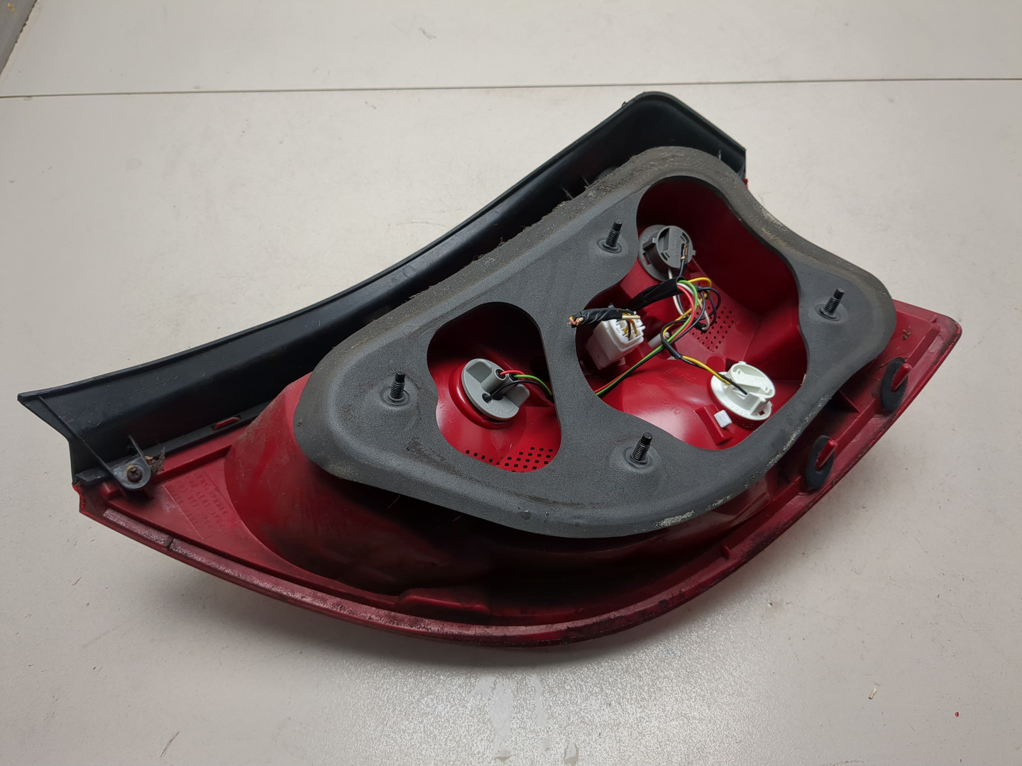 Фонарь задний левый