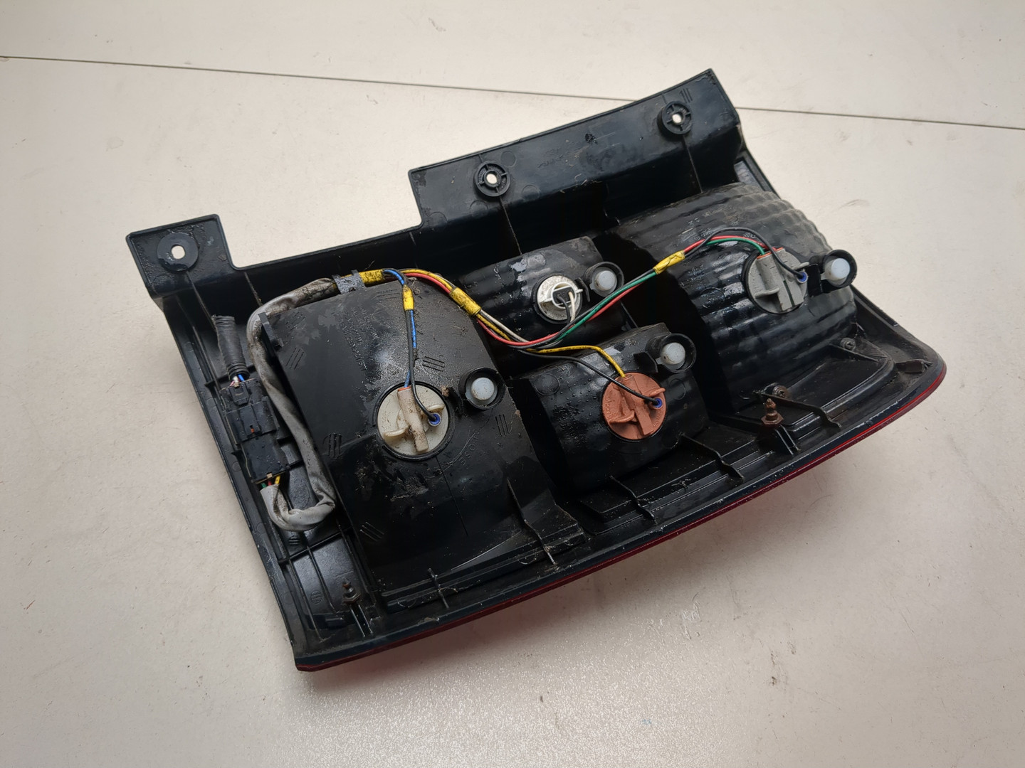 Фонарь задний левый