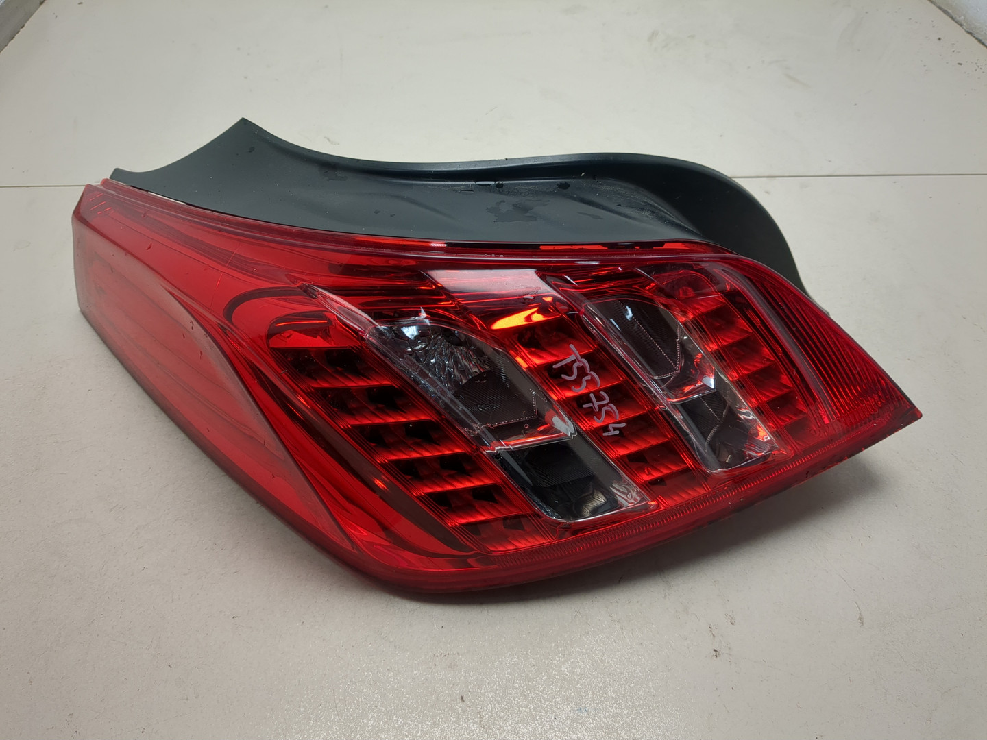 Фонарь задний левый