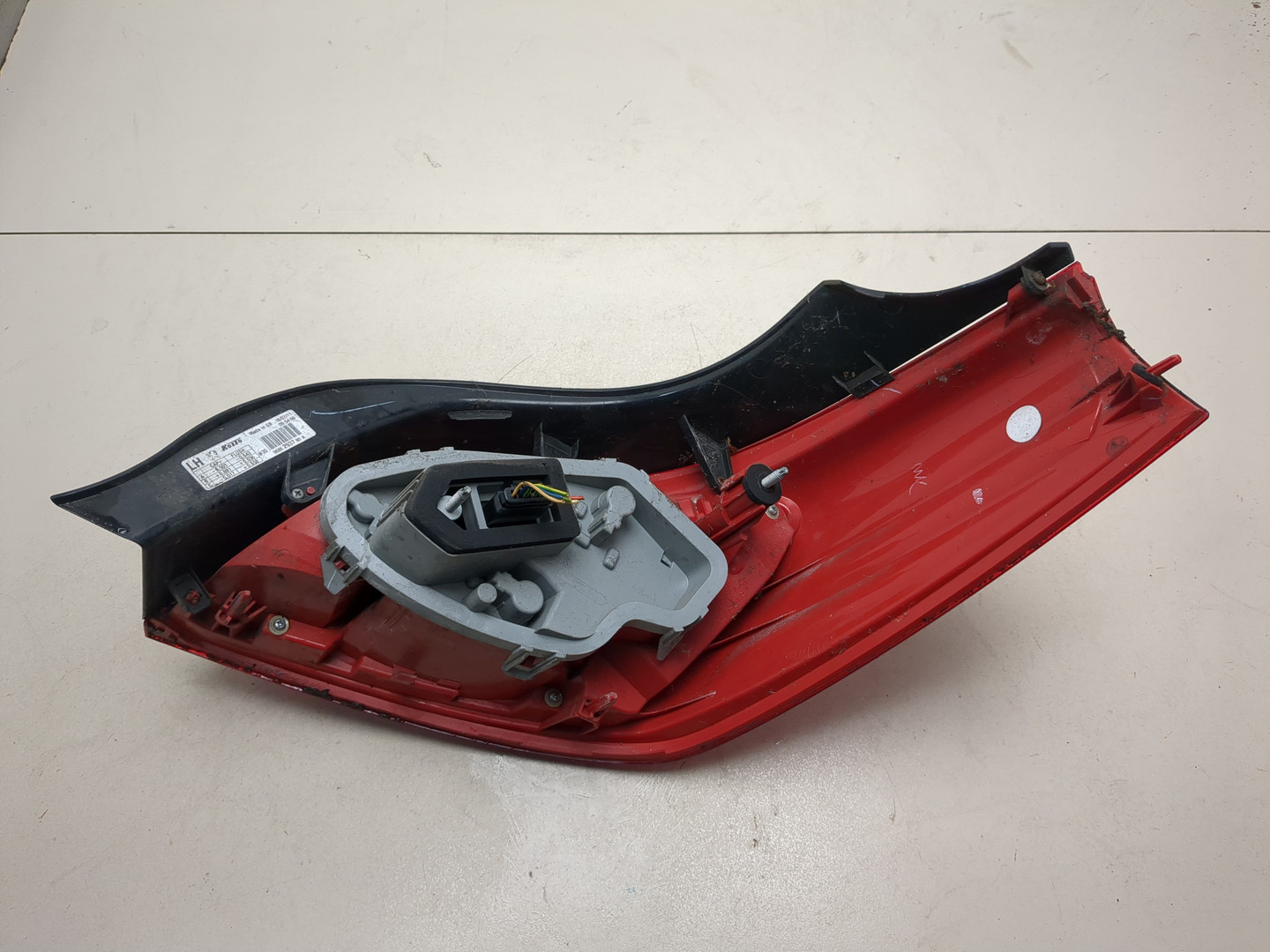 Фонарь задний левый