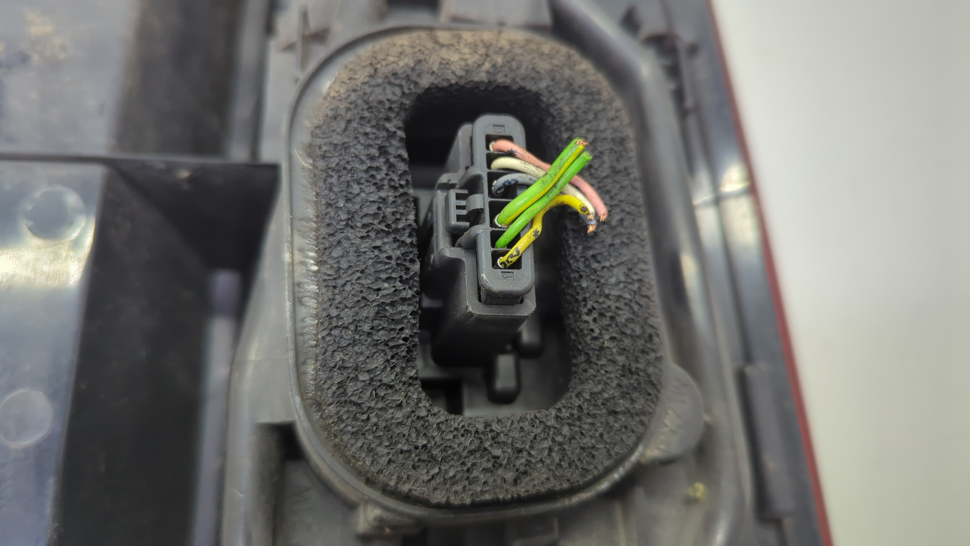 Фонарь задний левый