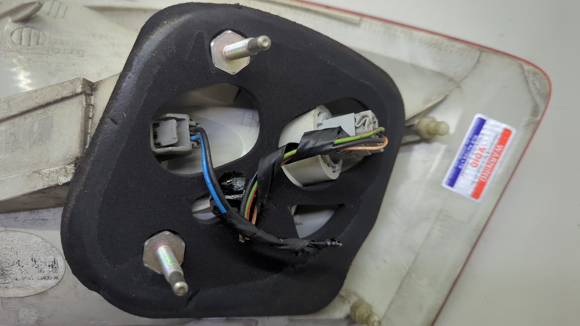 Фонарь задний левый