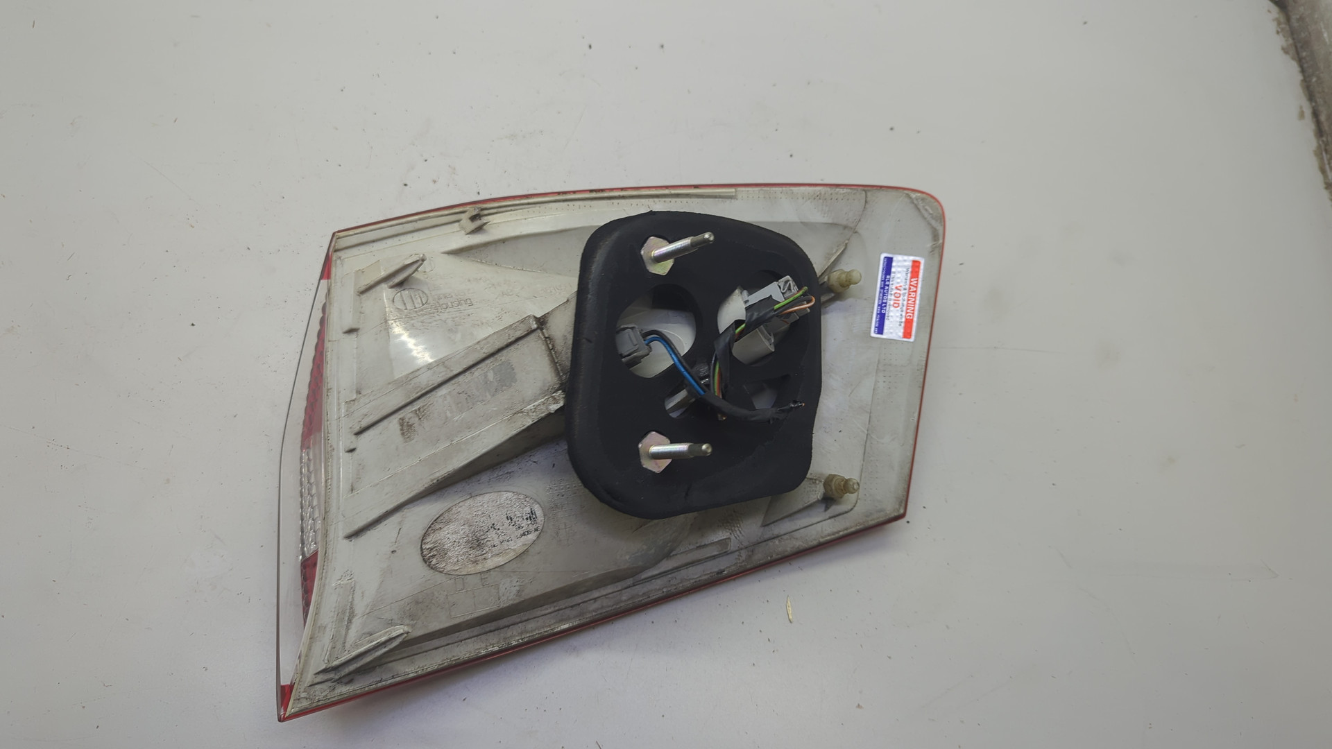 Фонарь задний левый