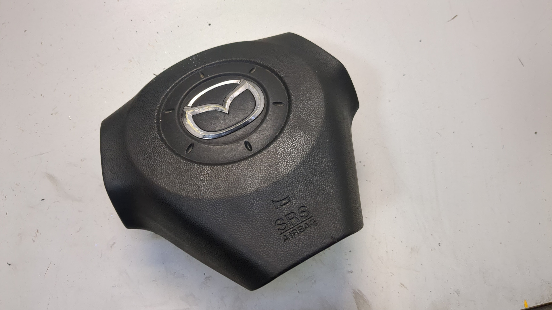 Подушка безопасности в рулевое колесо