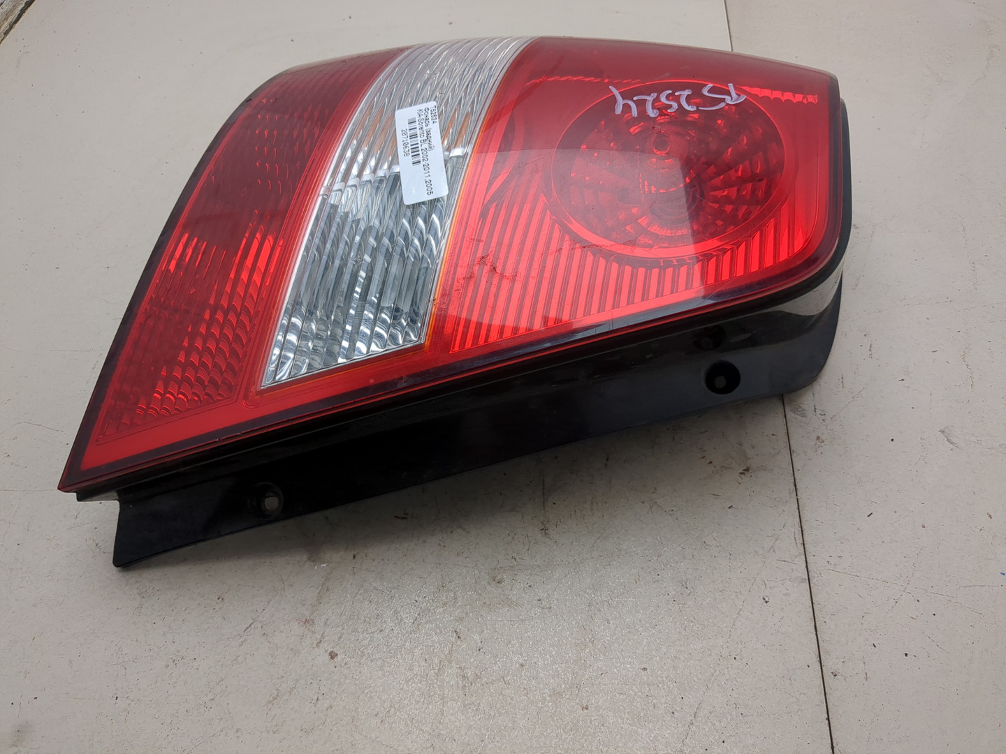 Фонарь задний левый