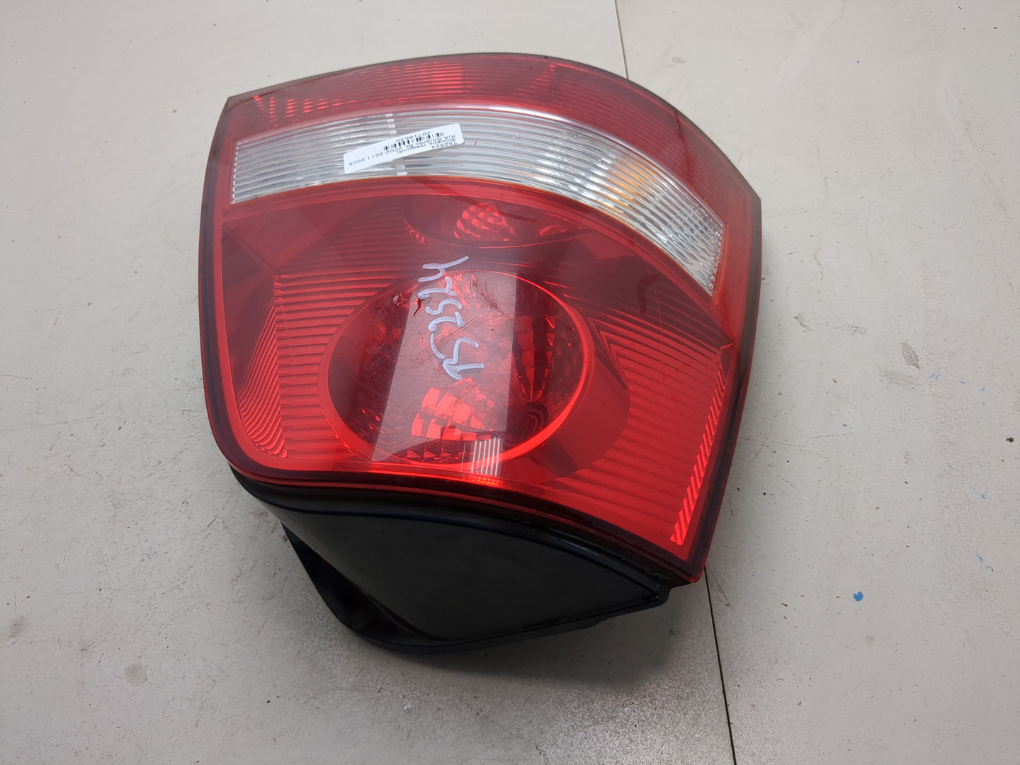 Фонарь задний левый