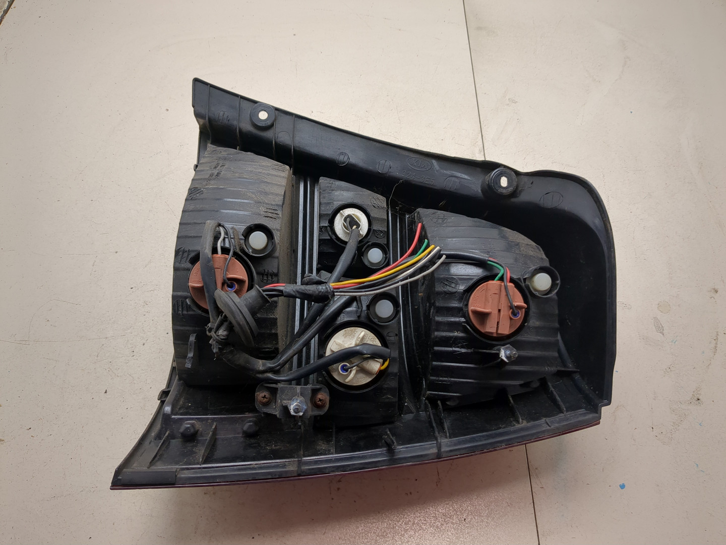 Фонарь задний левый