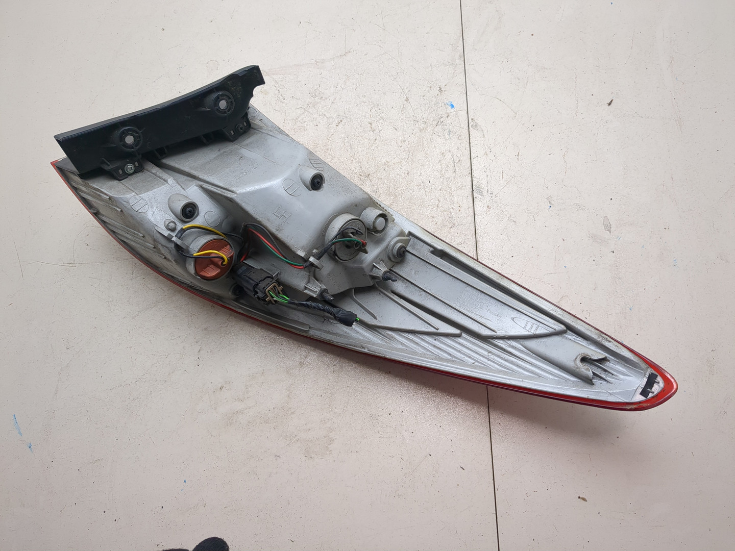 Фонарь задний левый