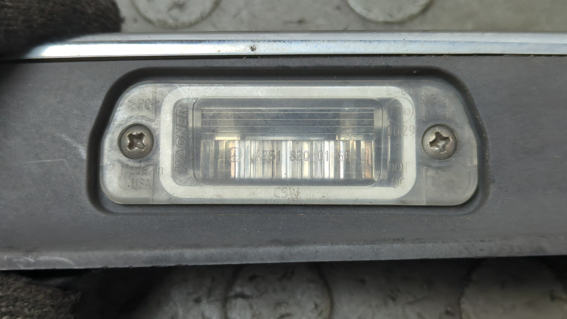 Фонарь подсветки номера