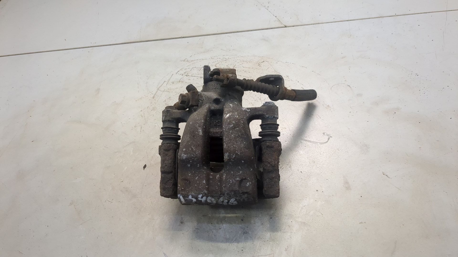 Суппорт задний левый