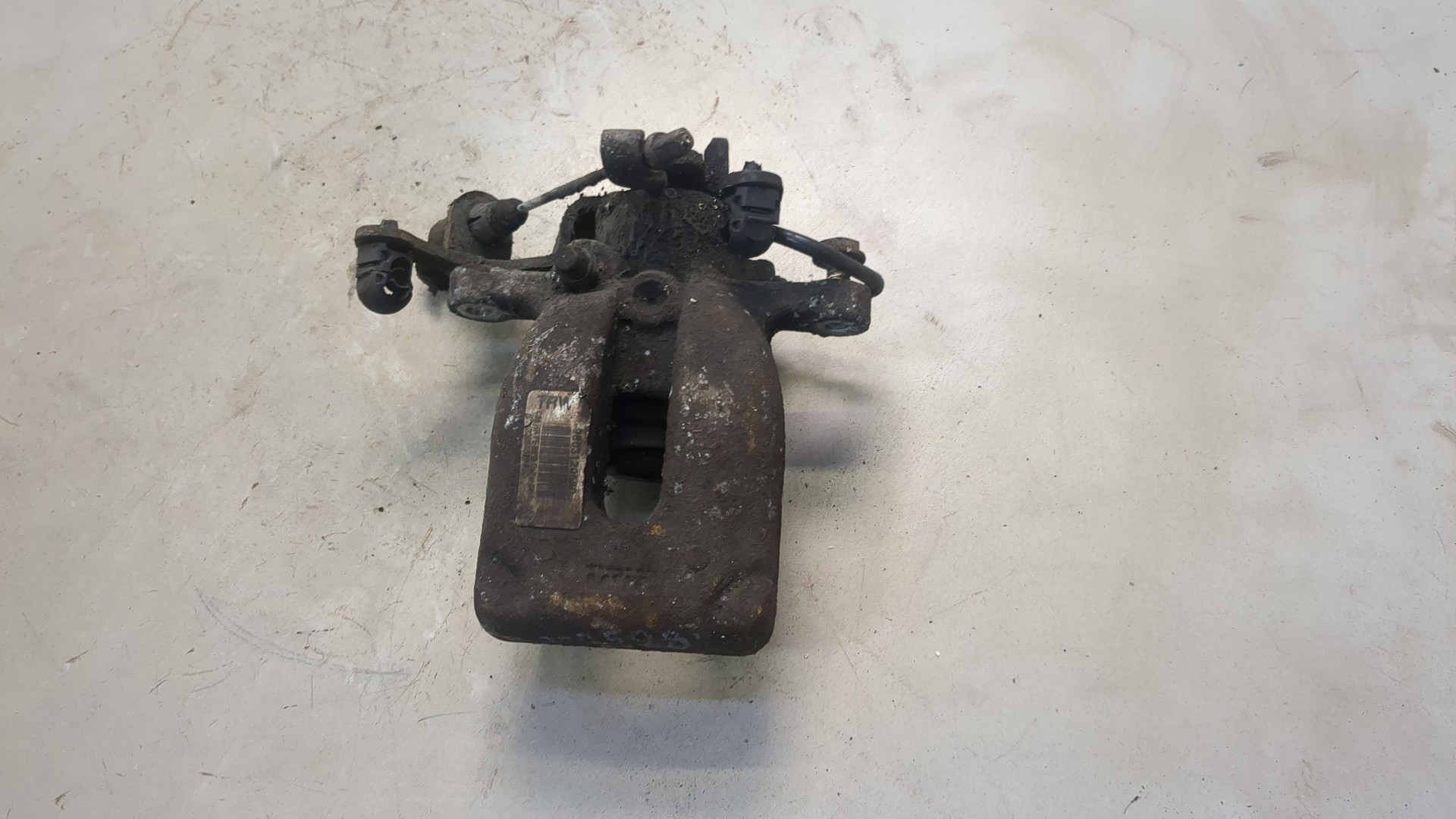 Суппорт задний левый