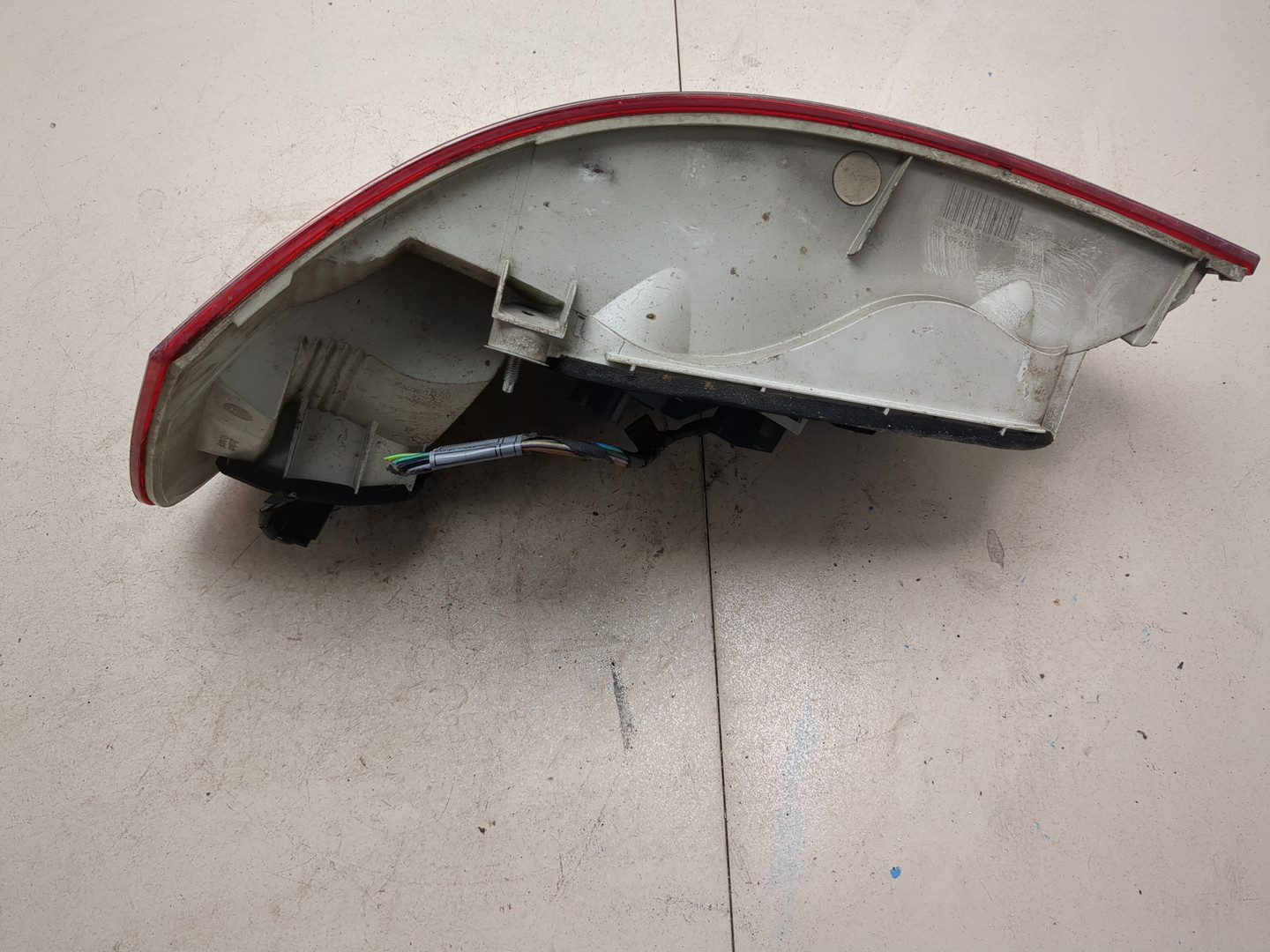 Фонарь задний левый