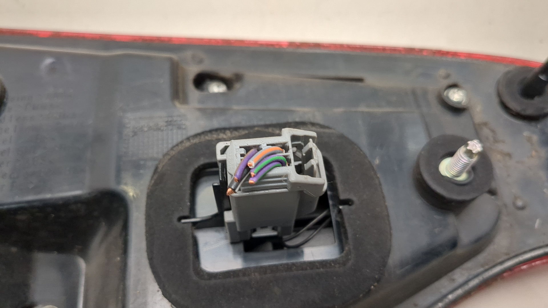 Фонарь задний левый