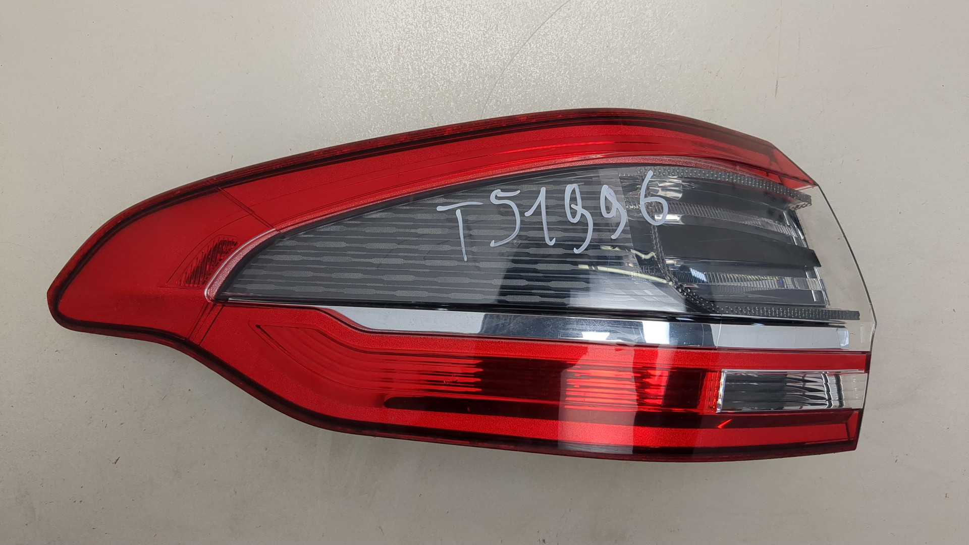 Фонарь задний левый