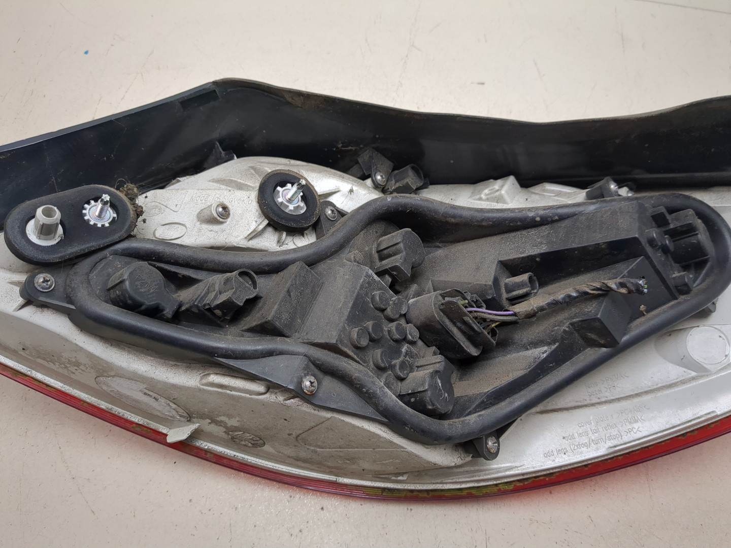 Фонарь задний левый