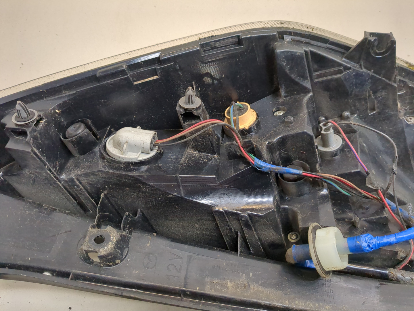 Фонарь задний левый