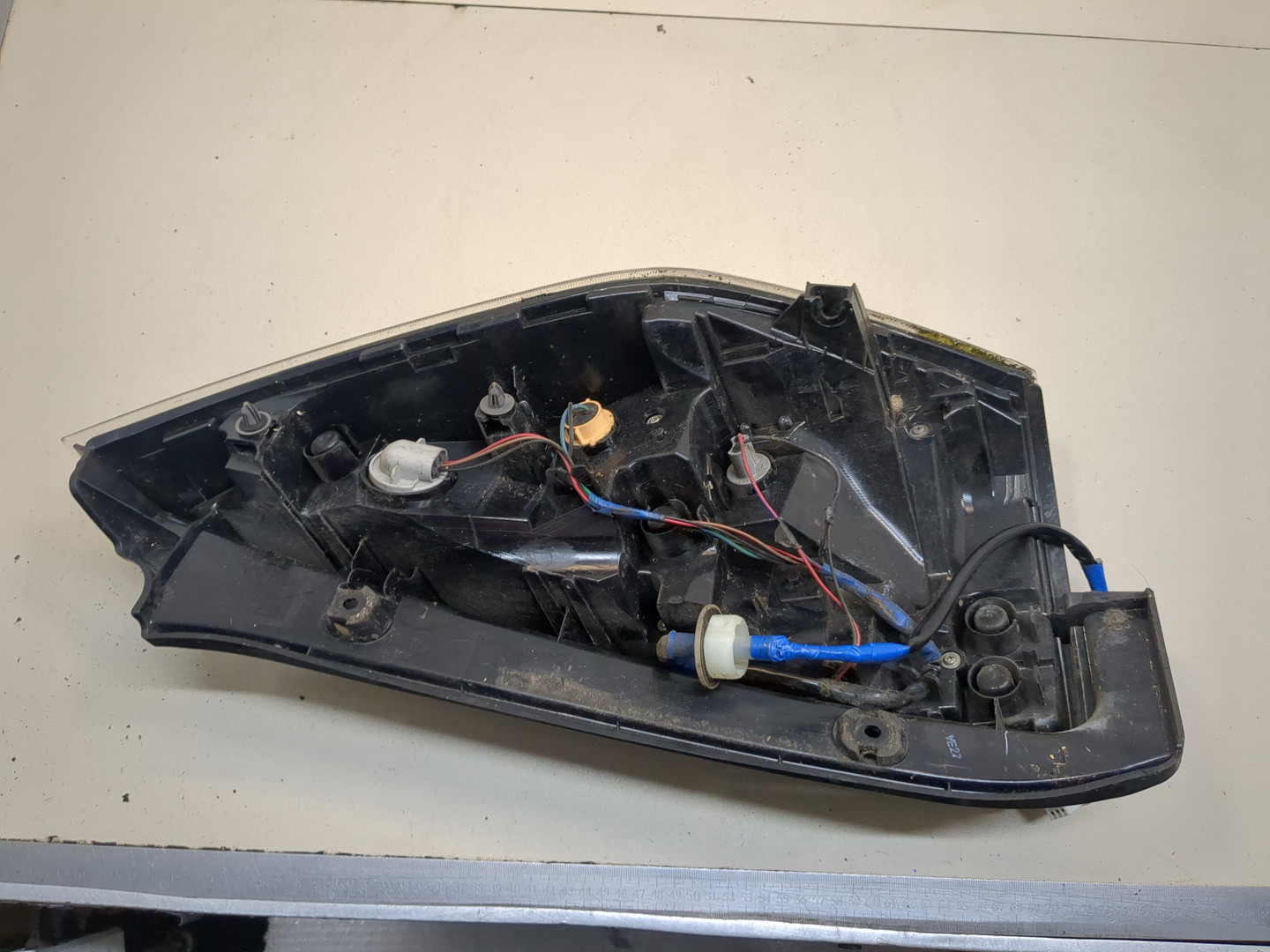 Фонарь задний левый