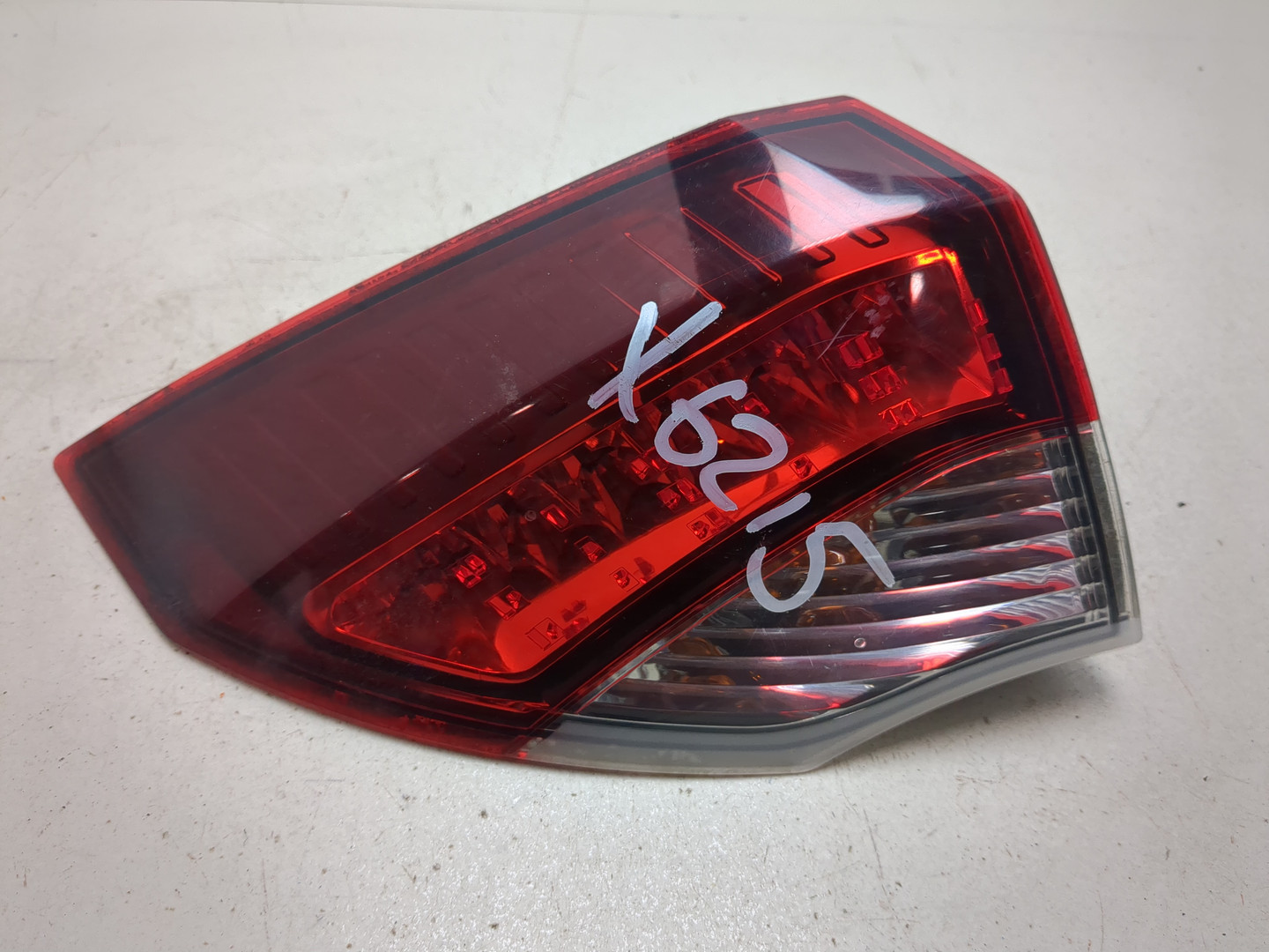 Фонарь задний левый