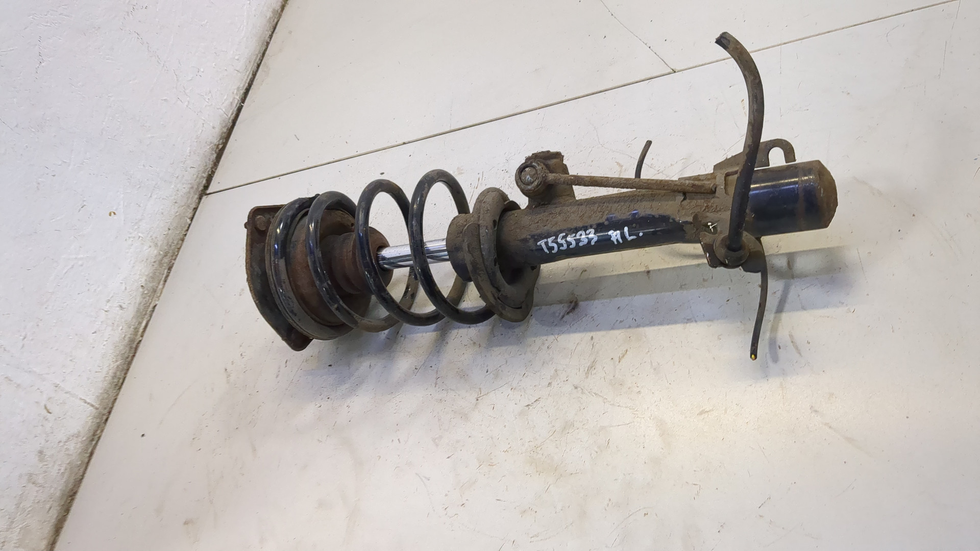 Амортизатор передний левый