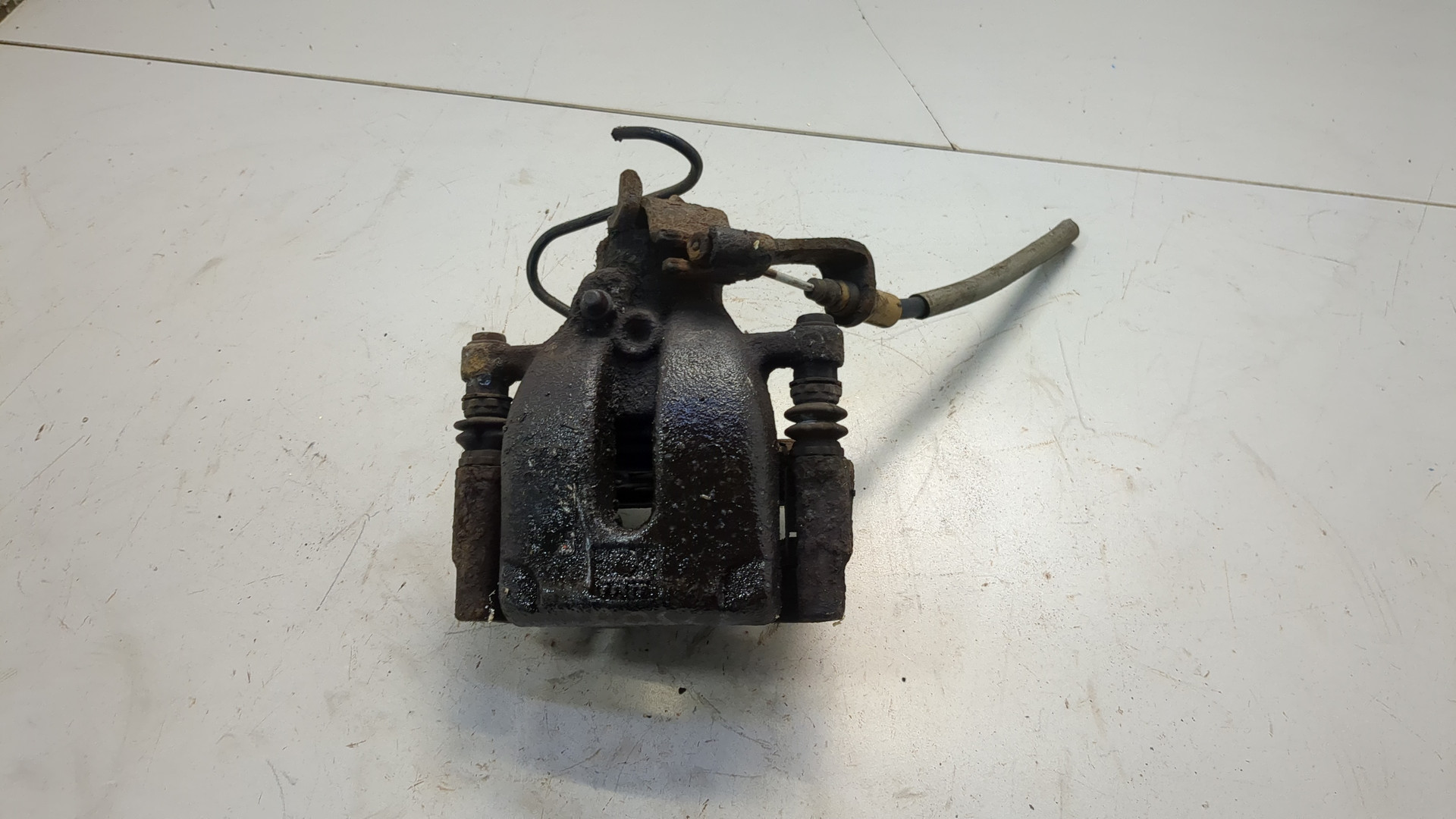 Суппорт задний левый