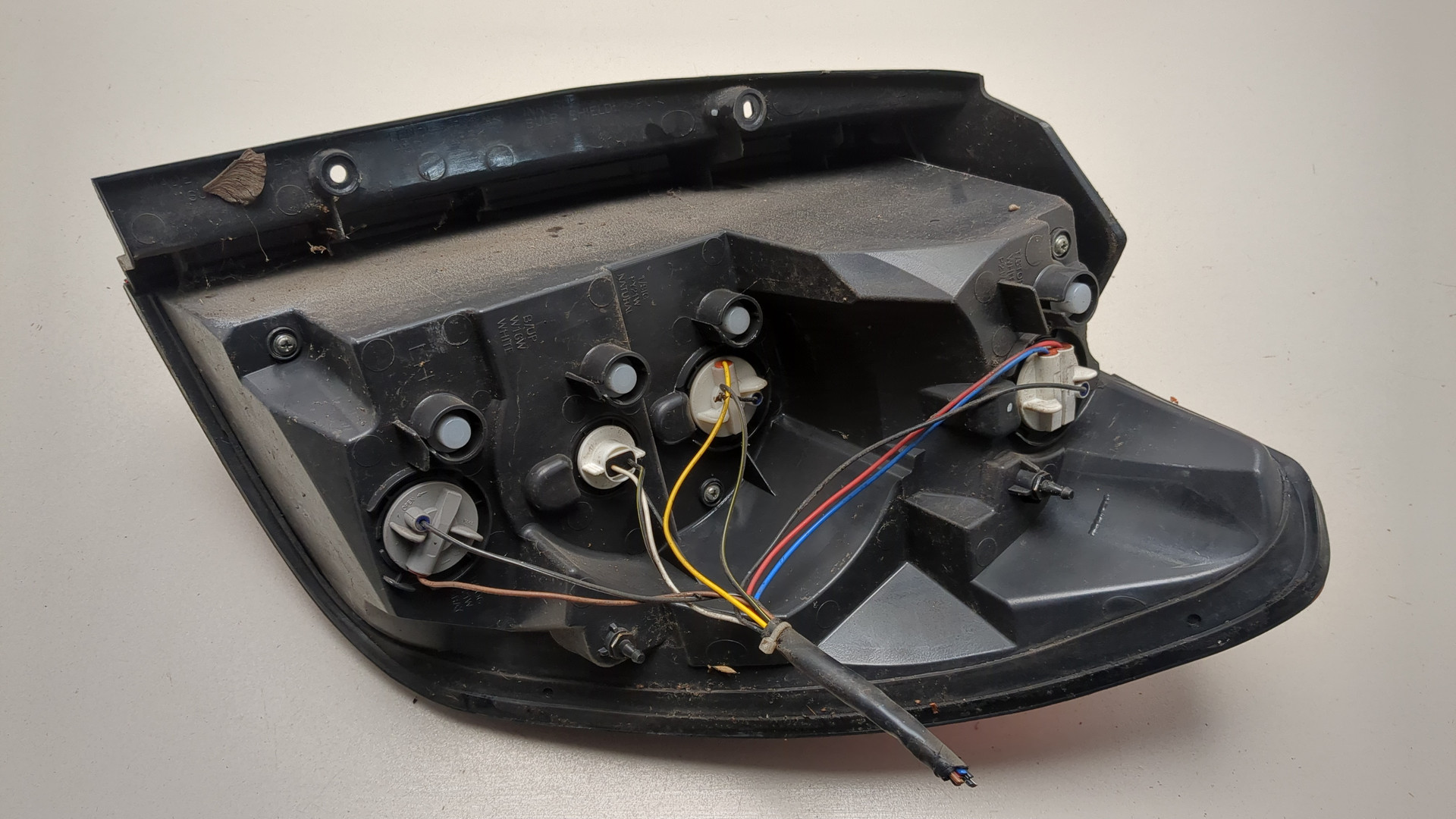 Фонарь задний левый