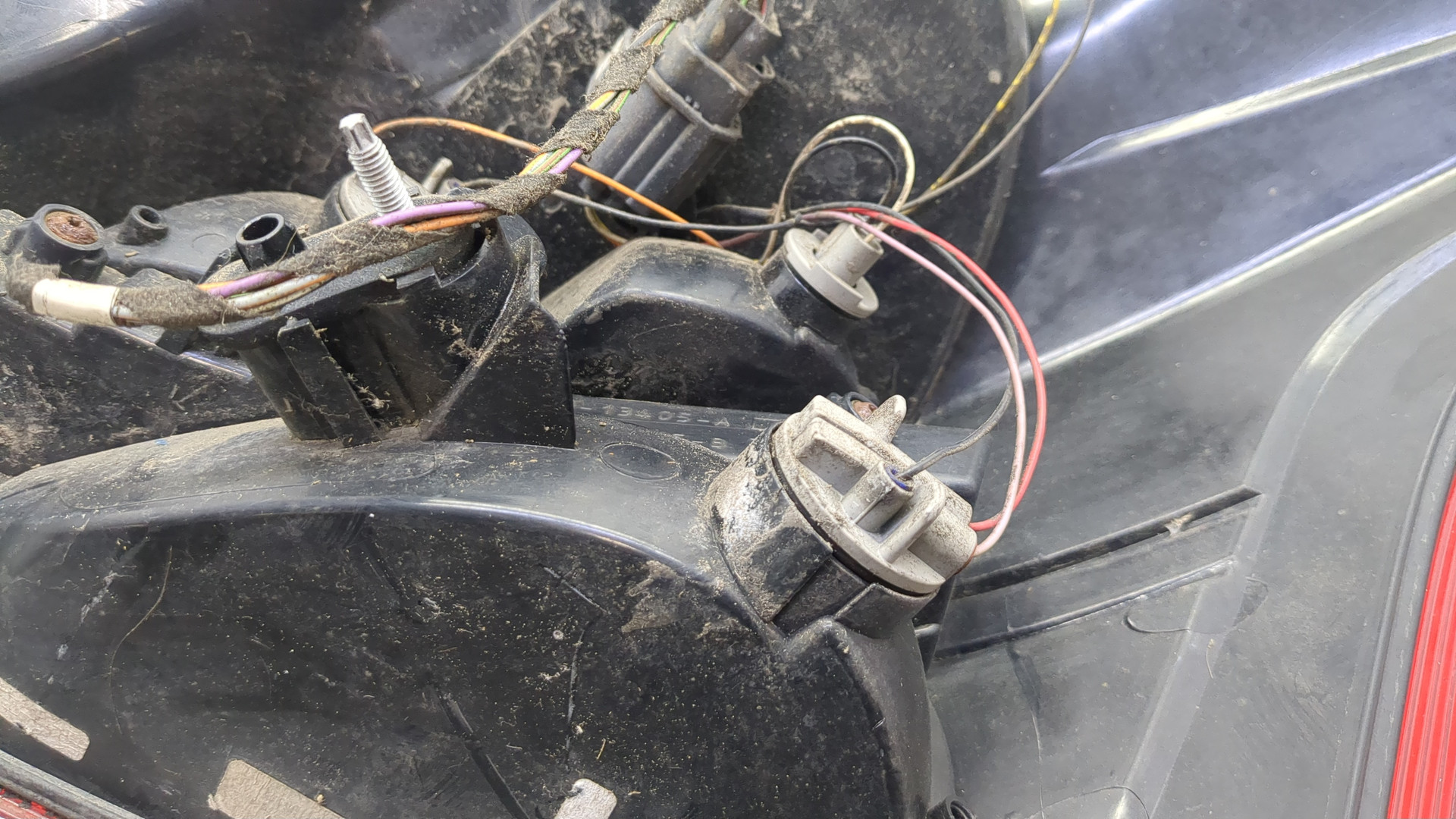 Фонарь задний левый