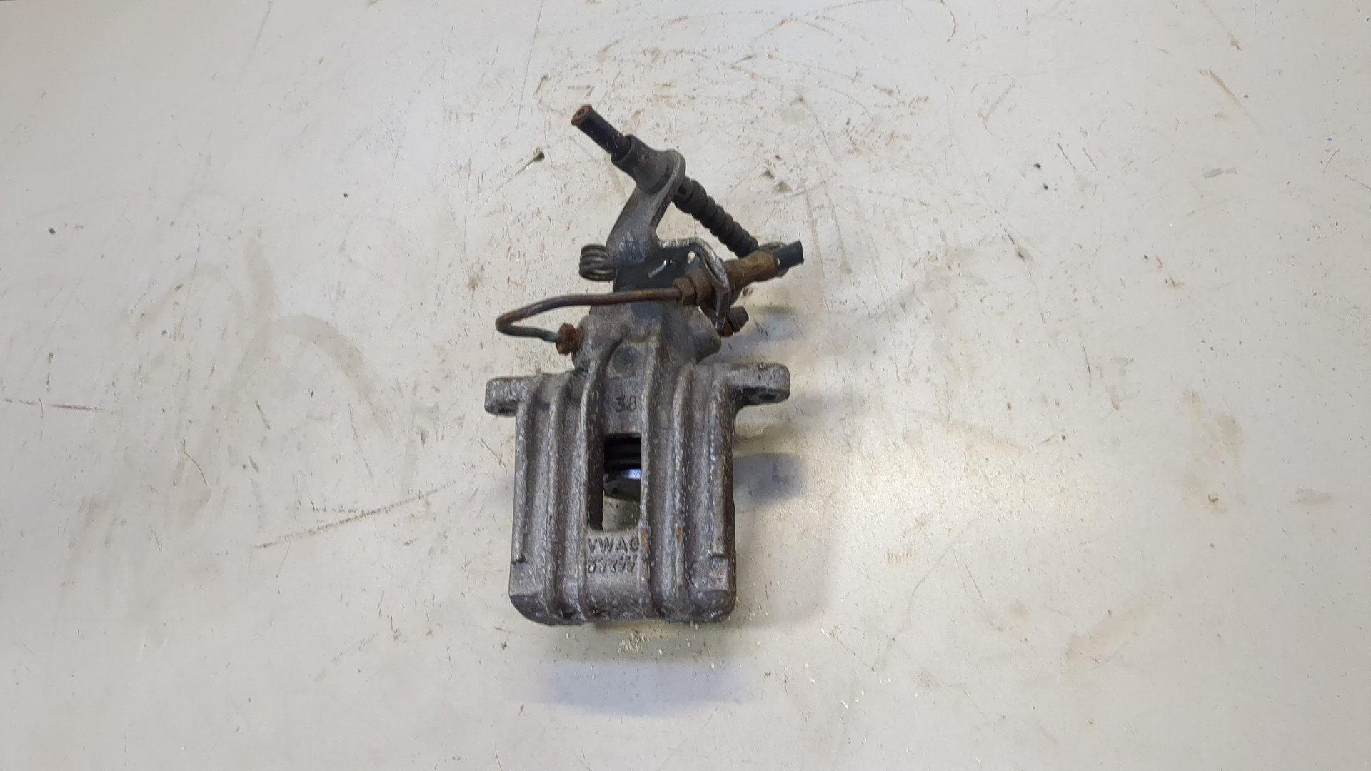 Суппорт задний левый