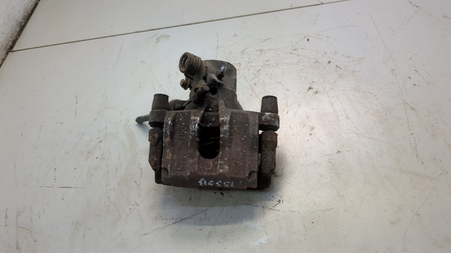 Суппорт задний левый