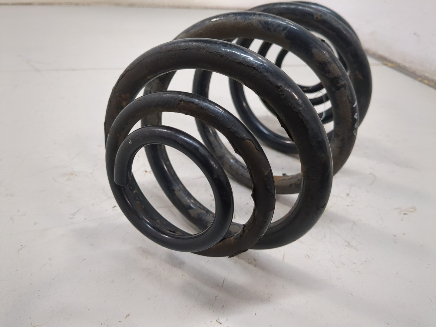 Пружина задняя